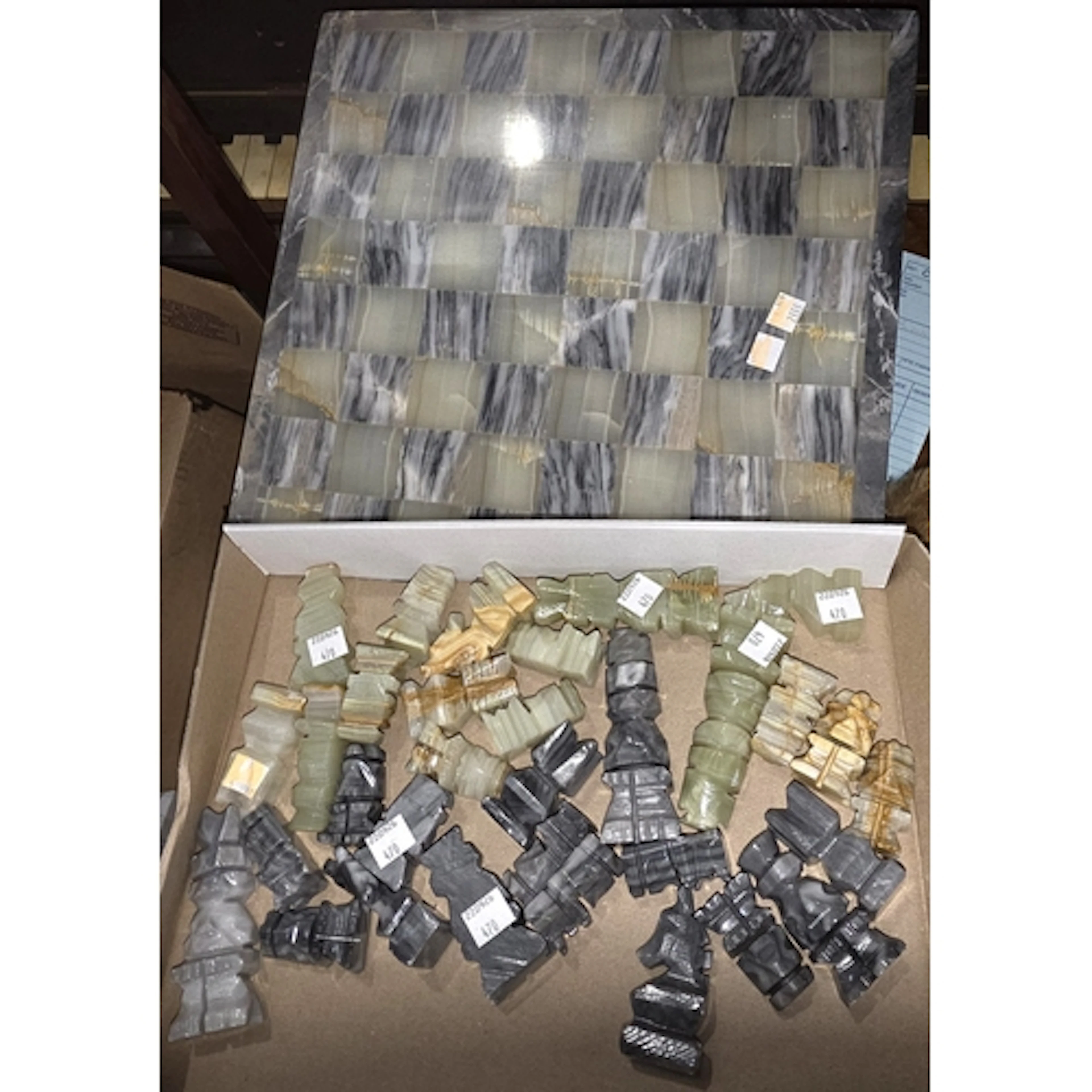 A modern green onyx and grey slate ornamental chess "coffee ...
