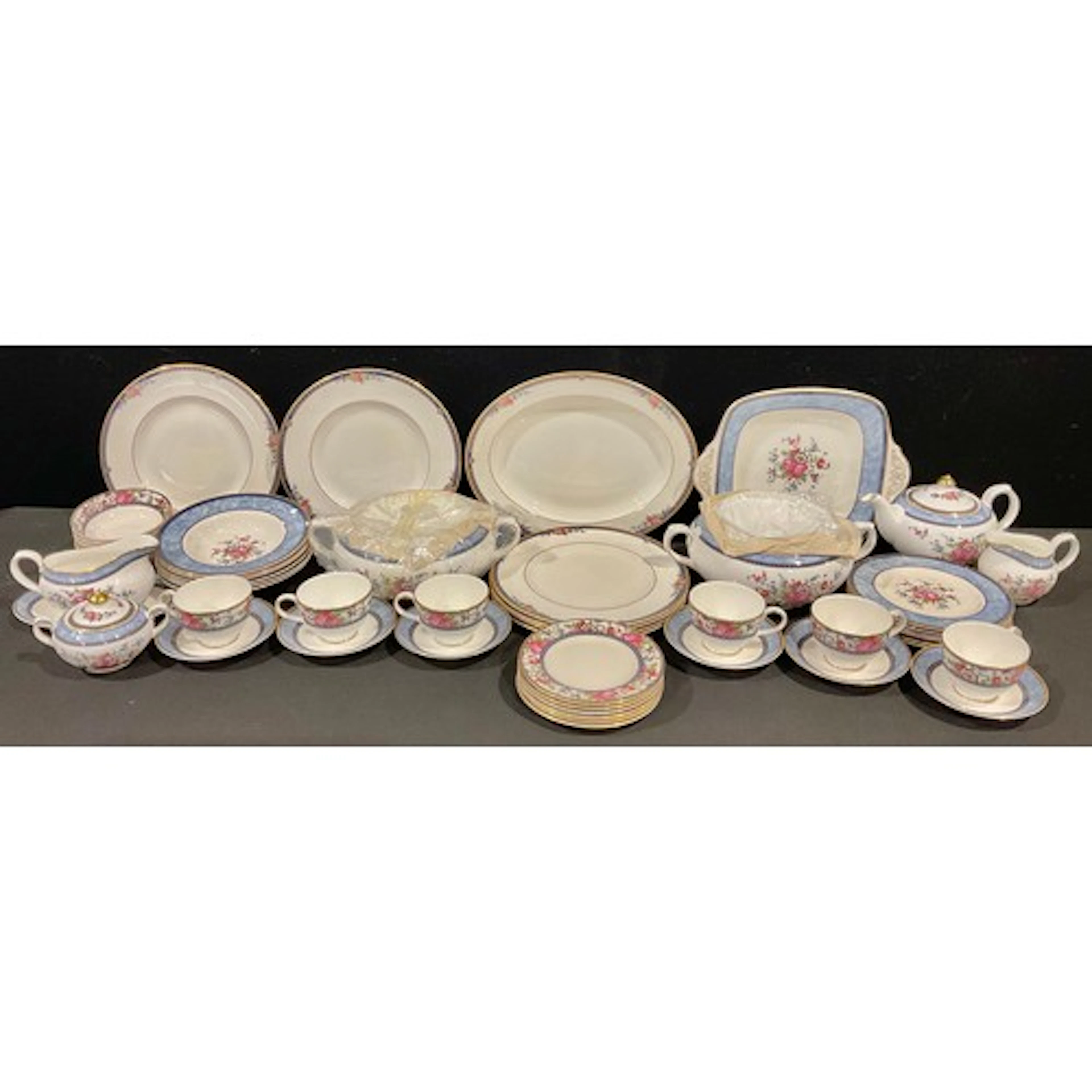 A Royal Doulton Centennial Rose pattern dinner & teas servic...
