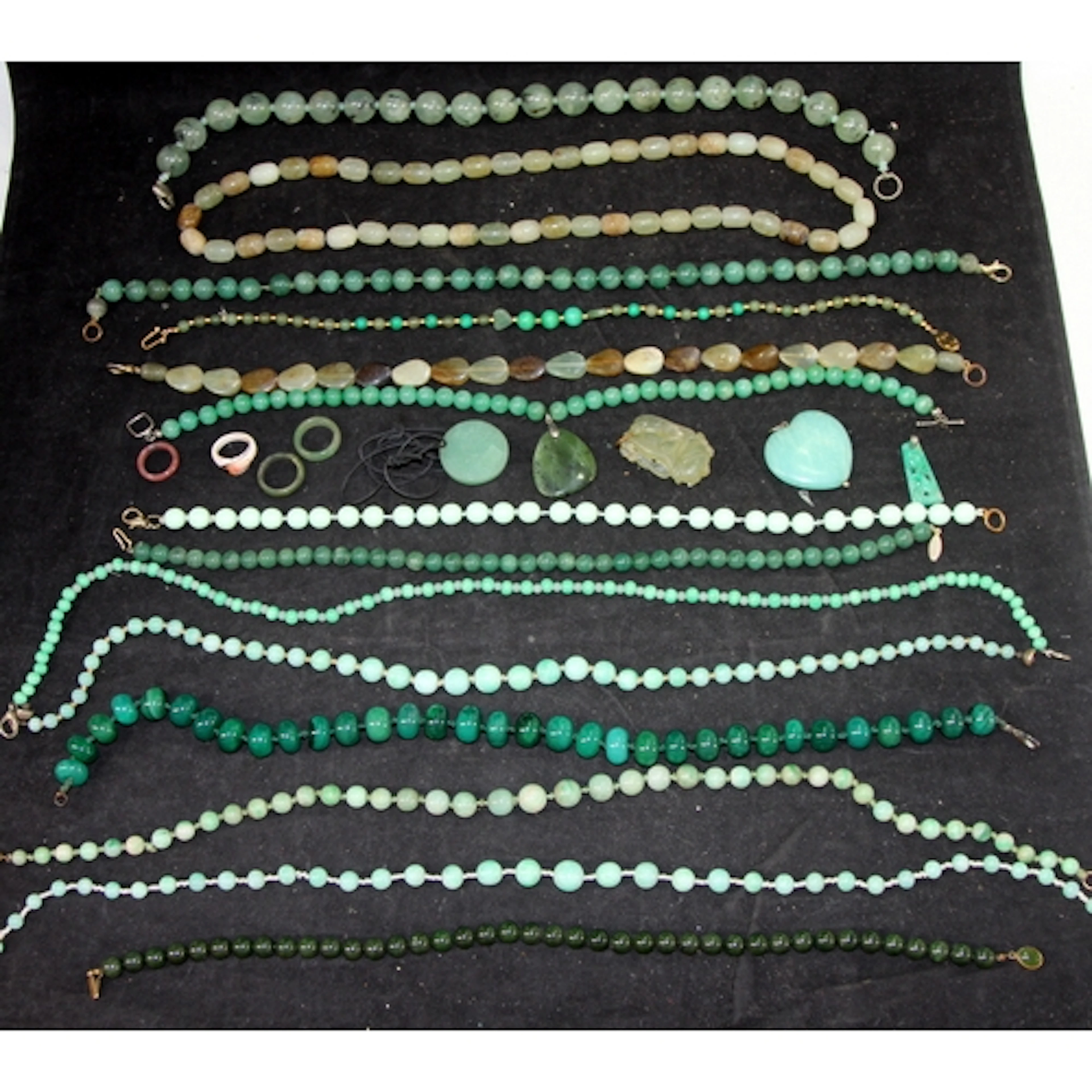 A collection of Jade and faux Jade beaded necklaces