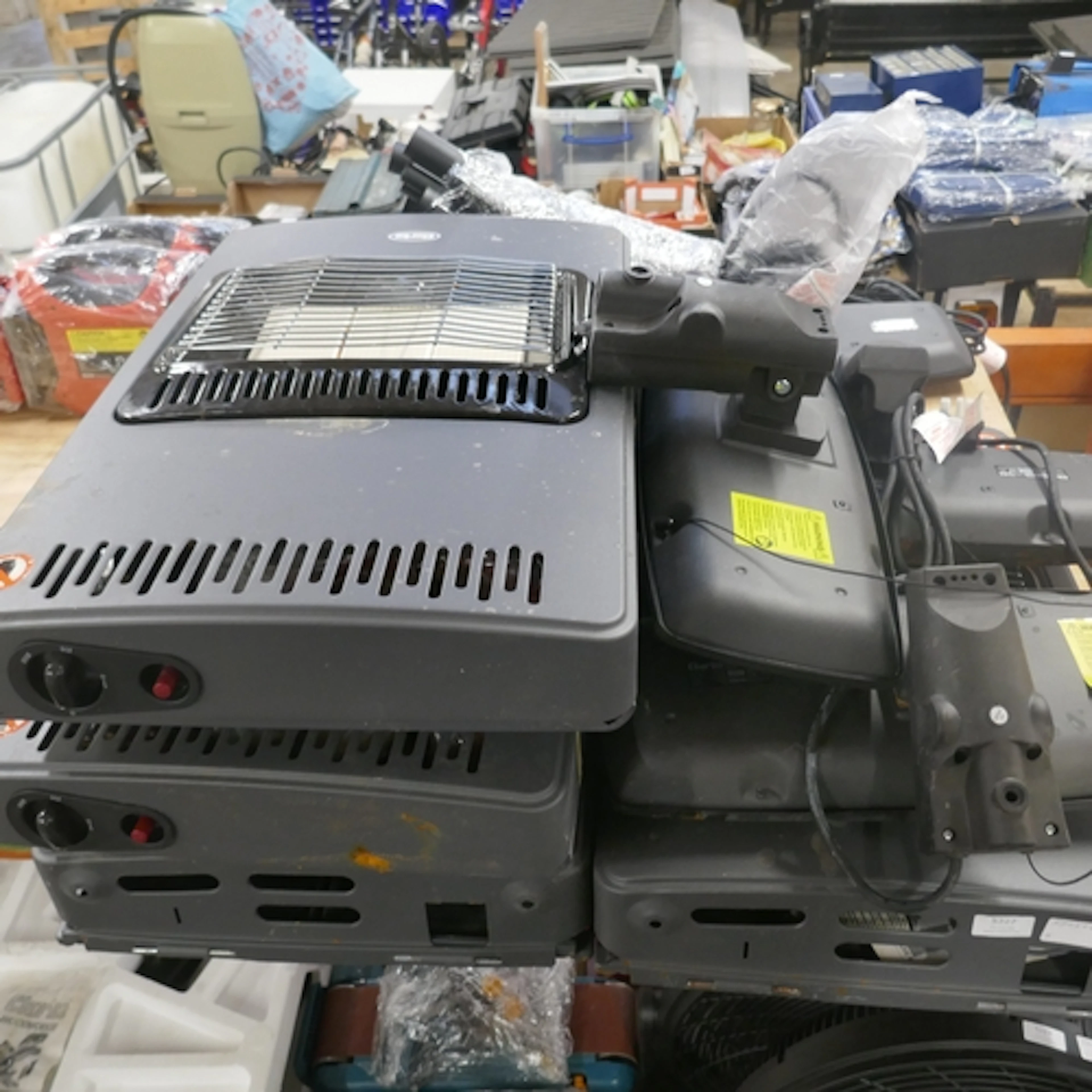 Four Clarke MGHZ mobile cabinet gas heaters and four Clarke ...