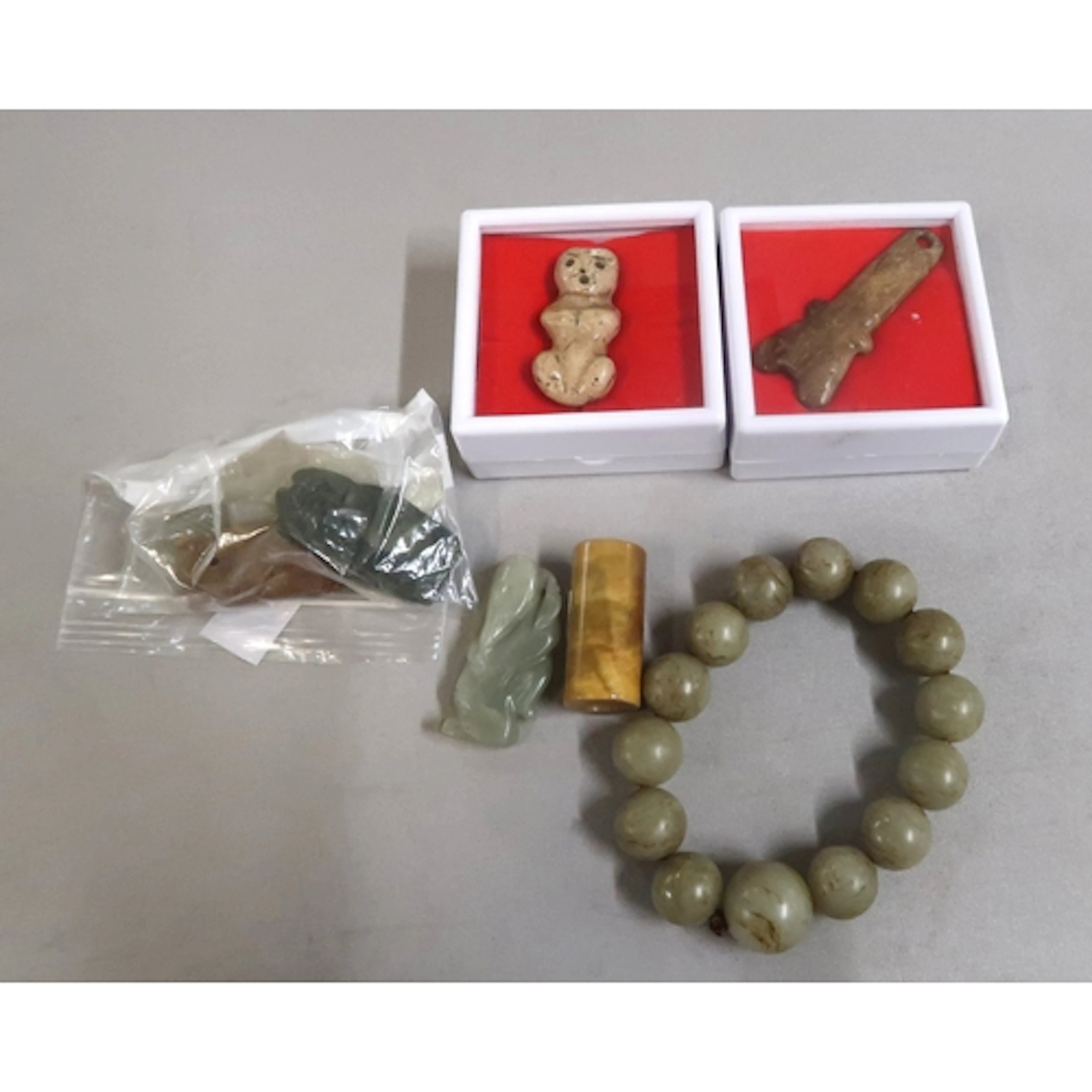 Quantity of various Chinese jade items to include a cylindri...