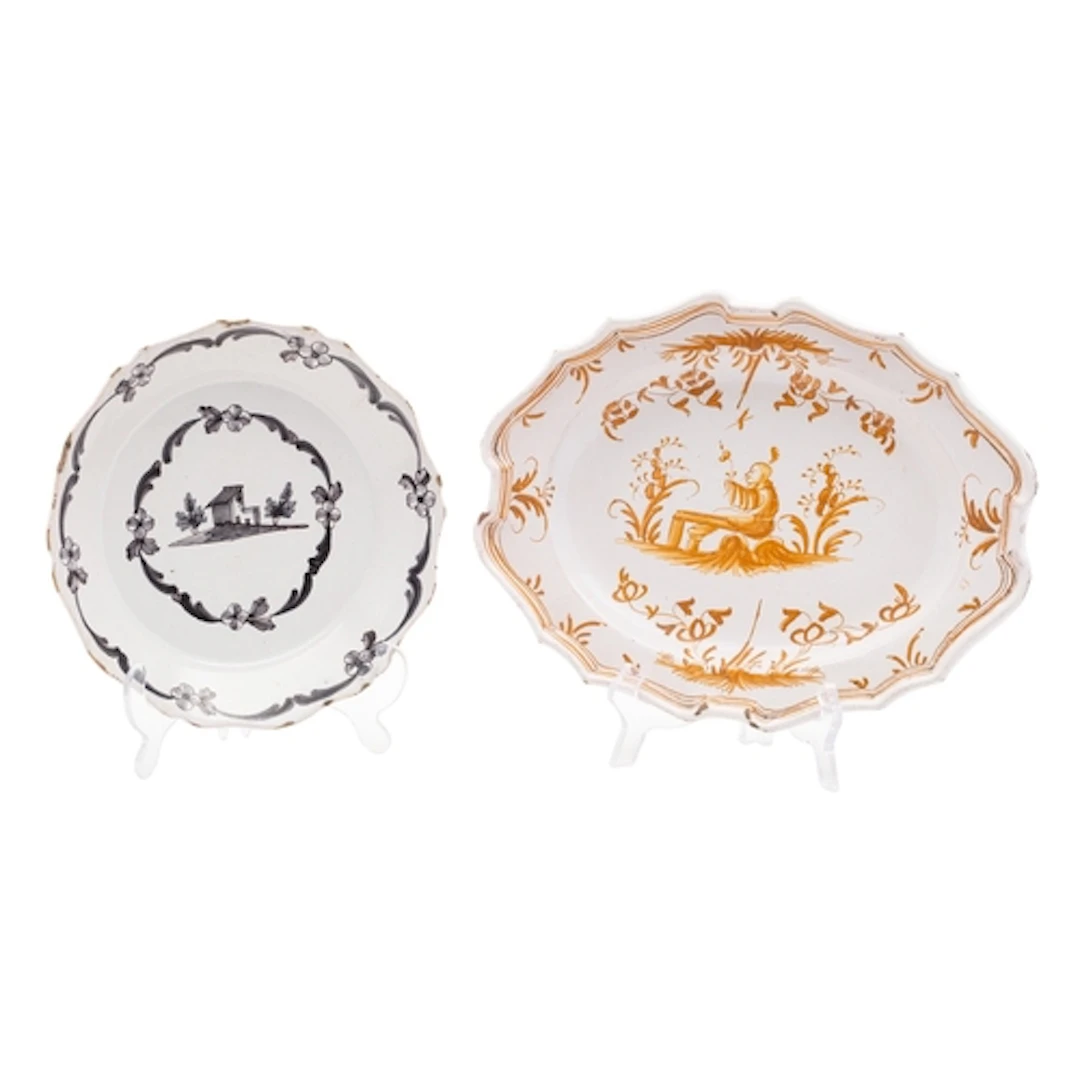 A Moustiers faience shaped oval dish and a similar Auxerre s...