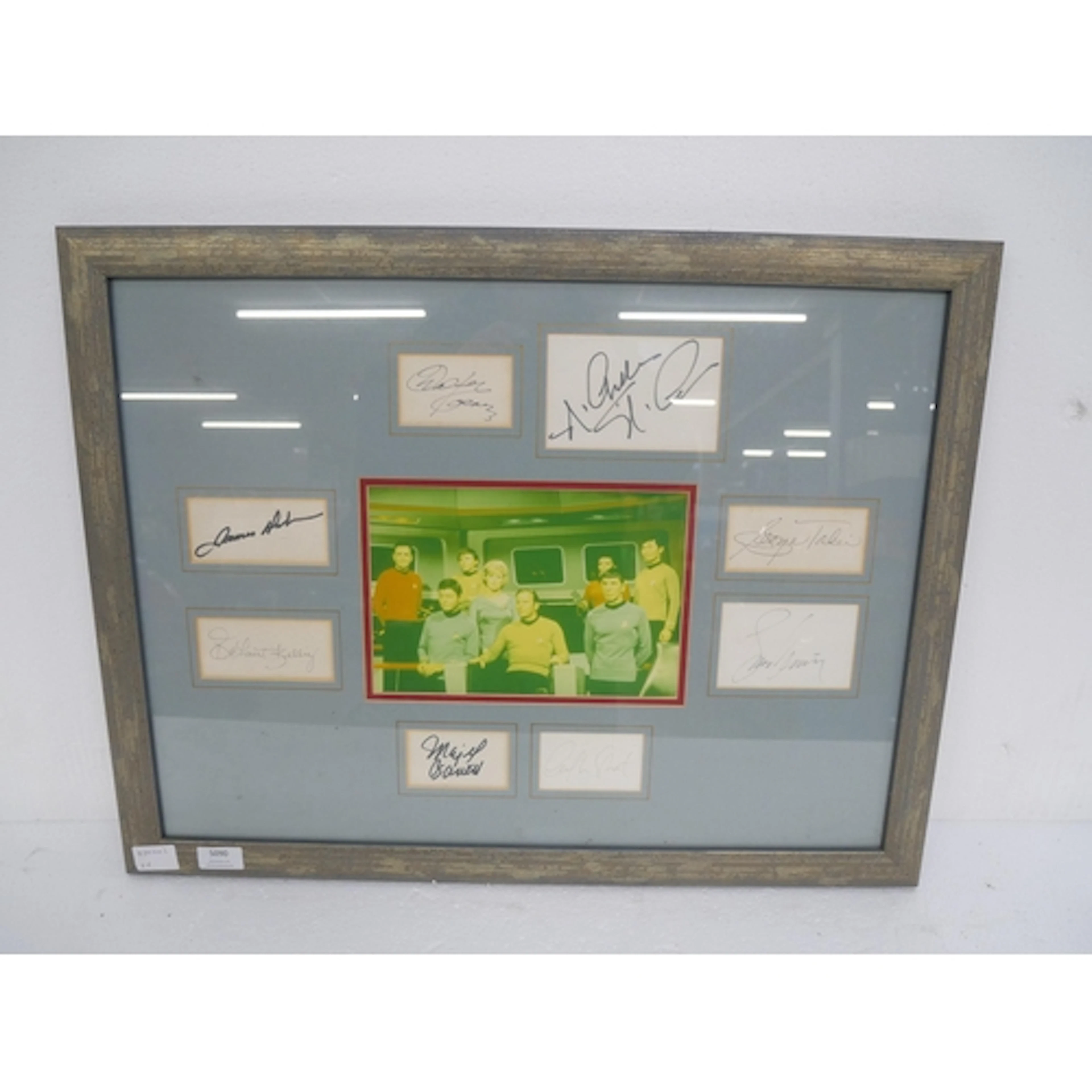 A framed and signed photograph of the cast of Star Trek feat...