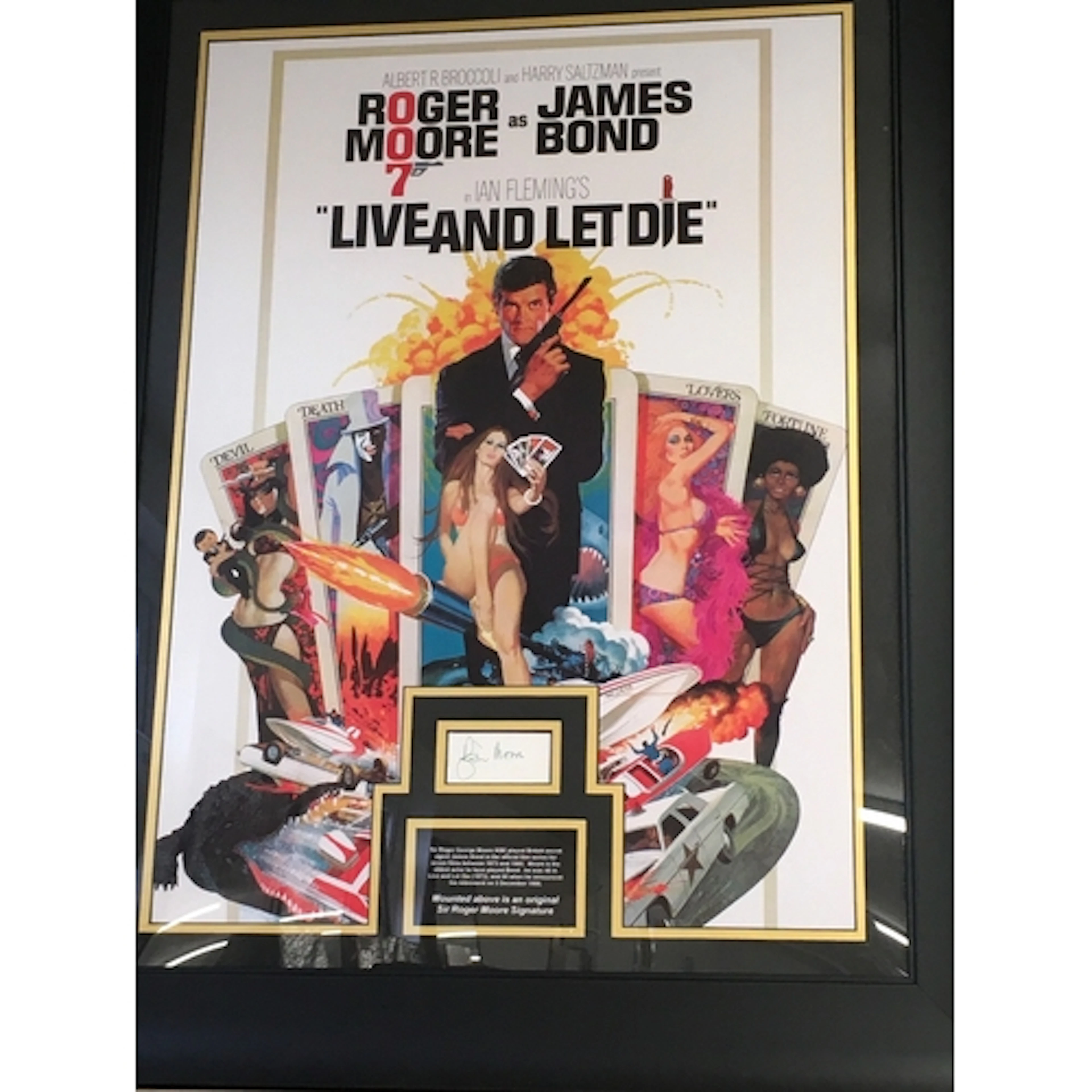 James Bond Live And Let Die. A framed and signed poster disp...