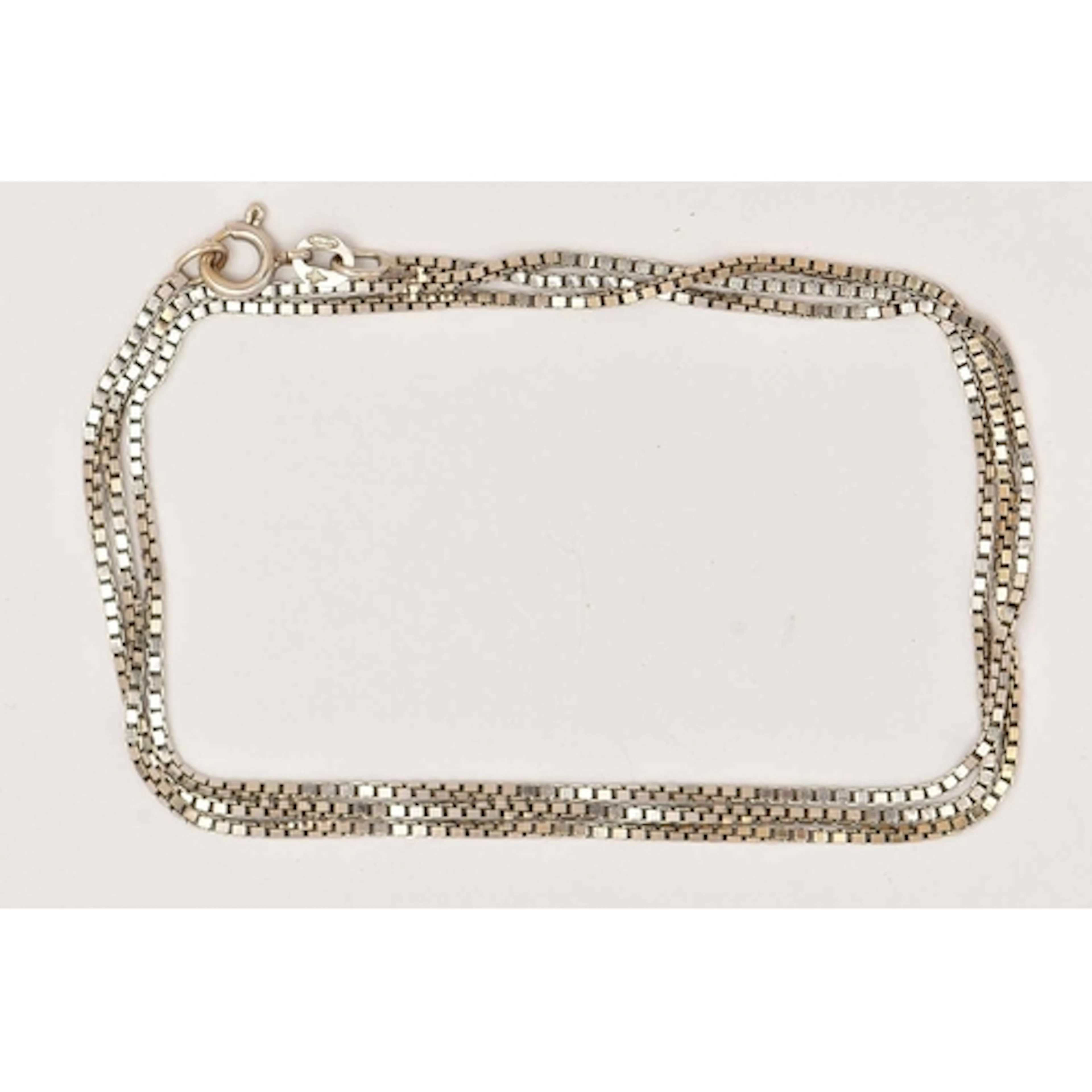 A WHITE METAL BOX LINK CHAIN, fitted with a spring clasp, st...