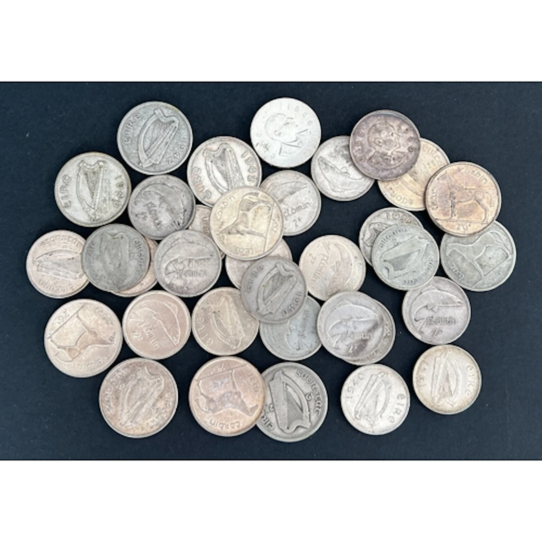 A group of thirty-four Irish circulated silver coins, compri...