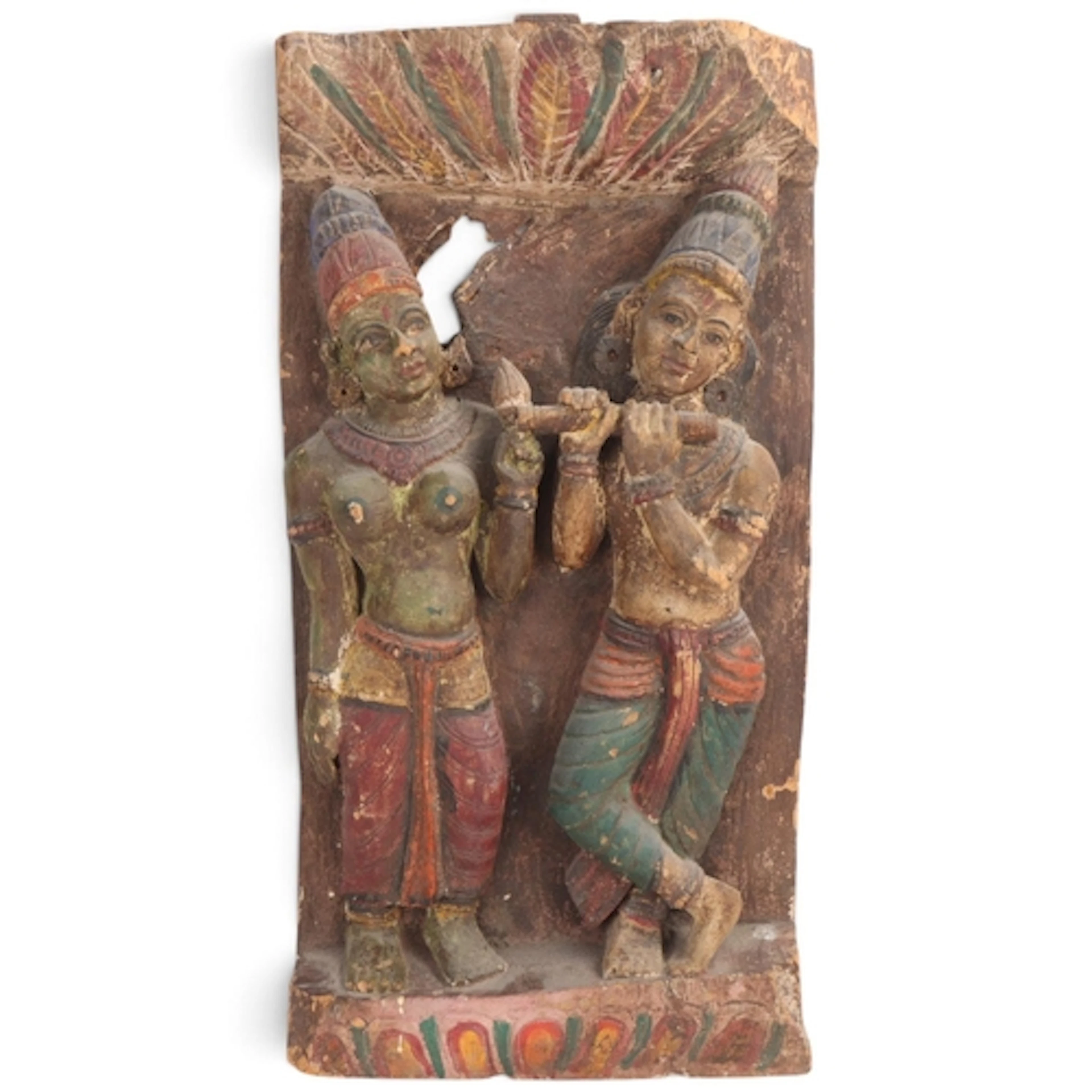 An Indian relief carved and painted wood panel, late 19th/ea...