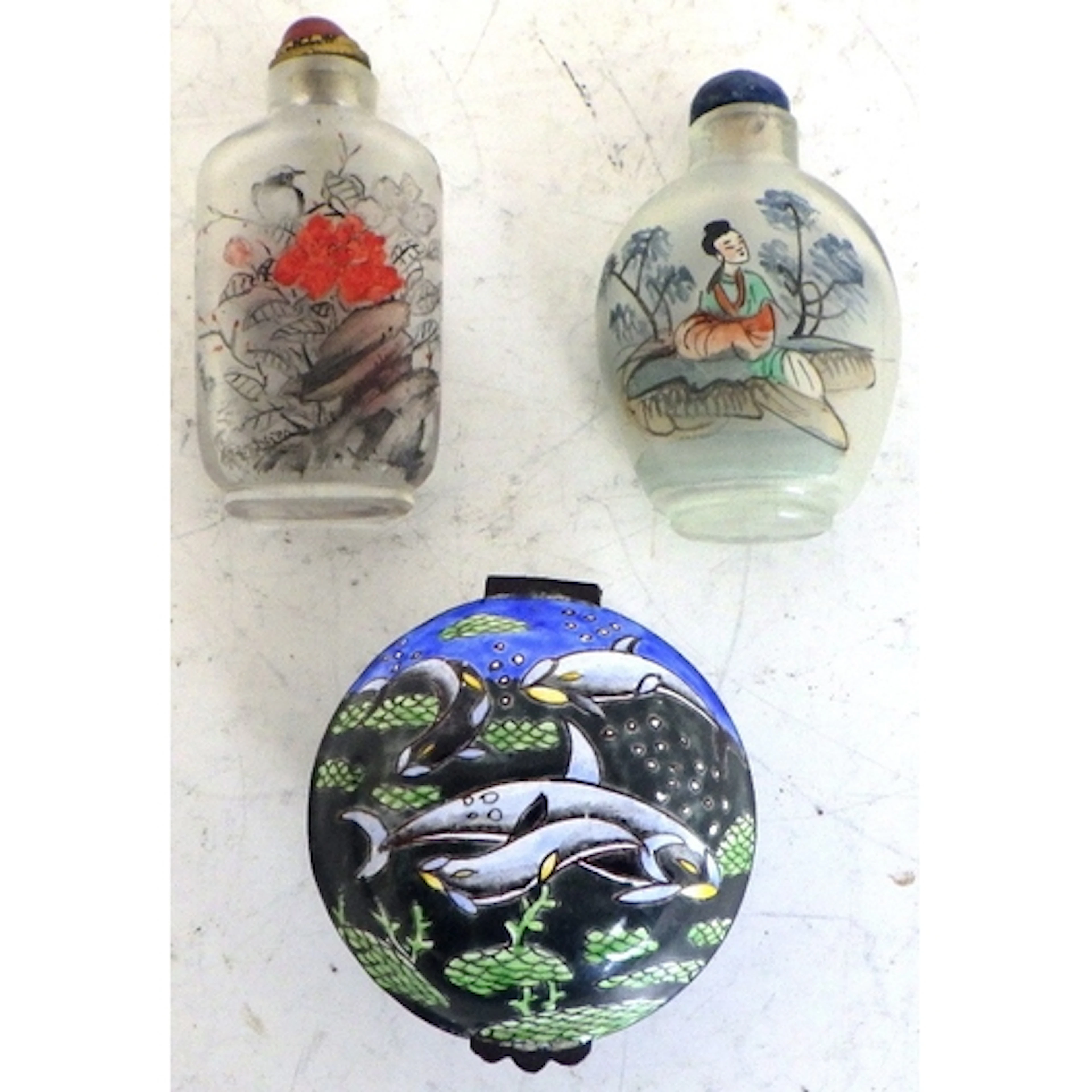 Two Chinese snuff bottles and an enamel pill box (3)