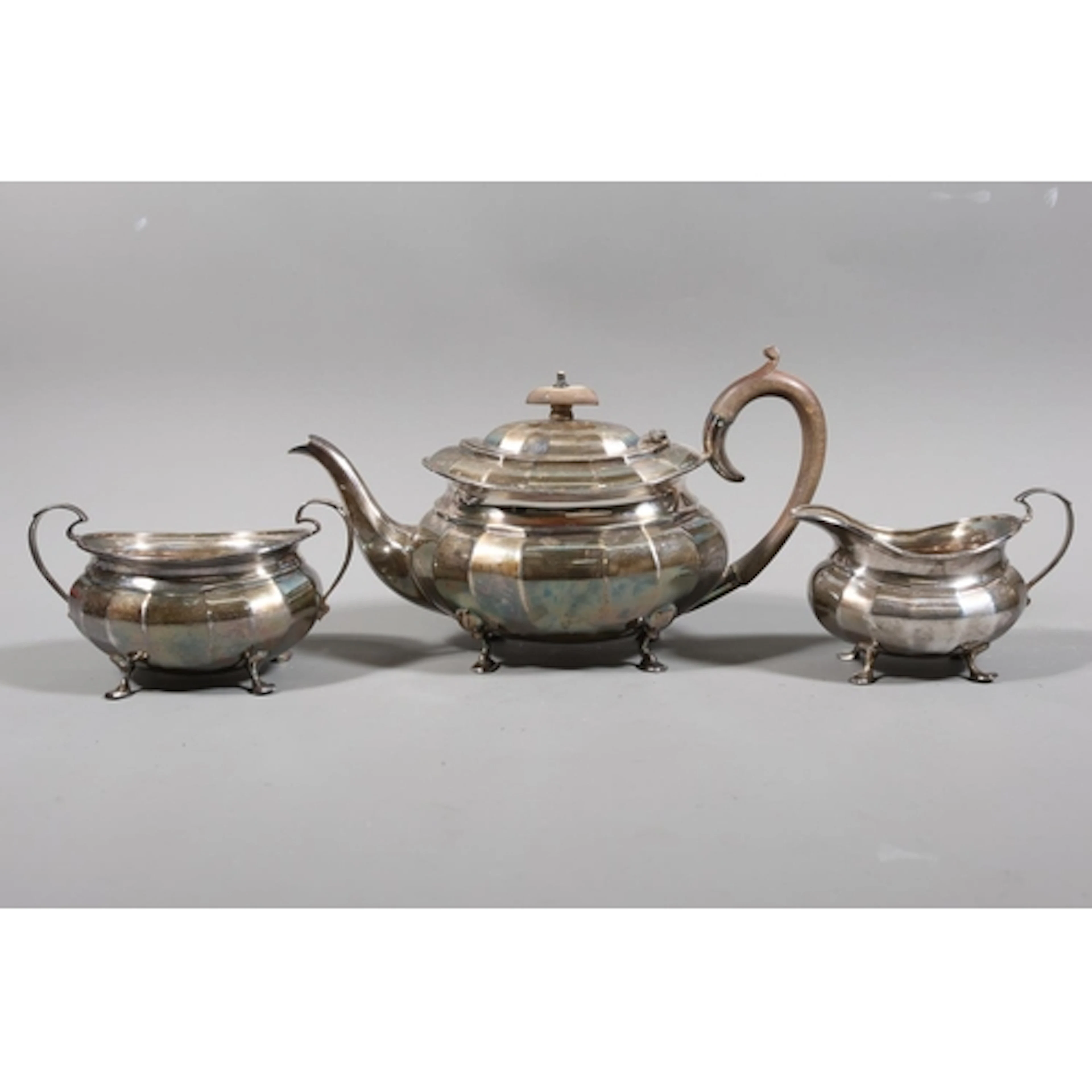 Three piece teaset, retailed b Hamilton & Inches, of cla...