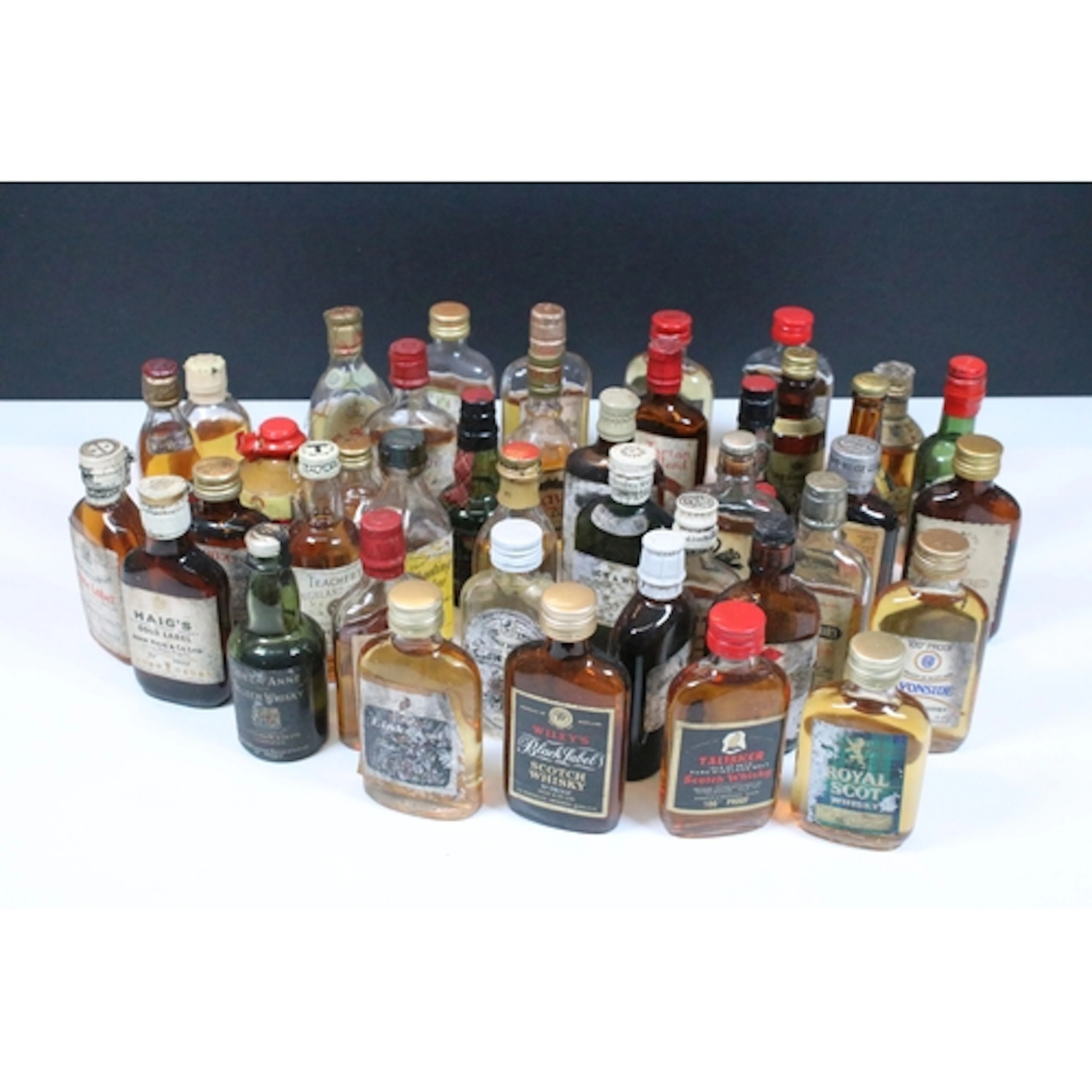 Collection of alcoholic miniatures, to comprise whiskies, mo...
