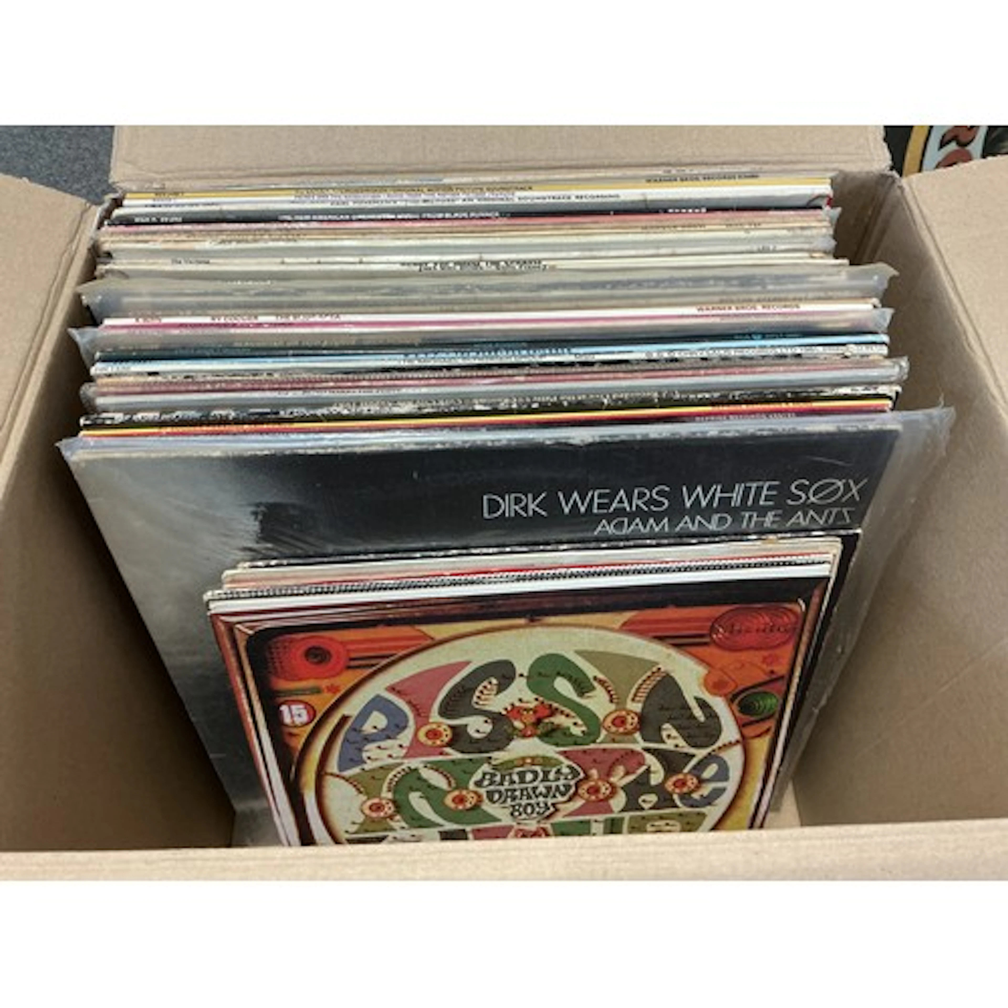 A box of LPs and 10” records by various artists including Pr...