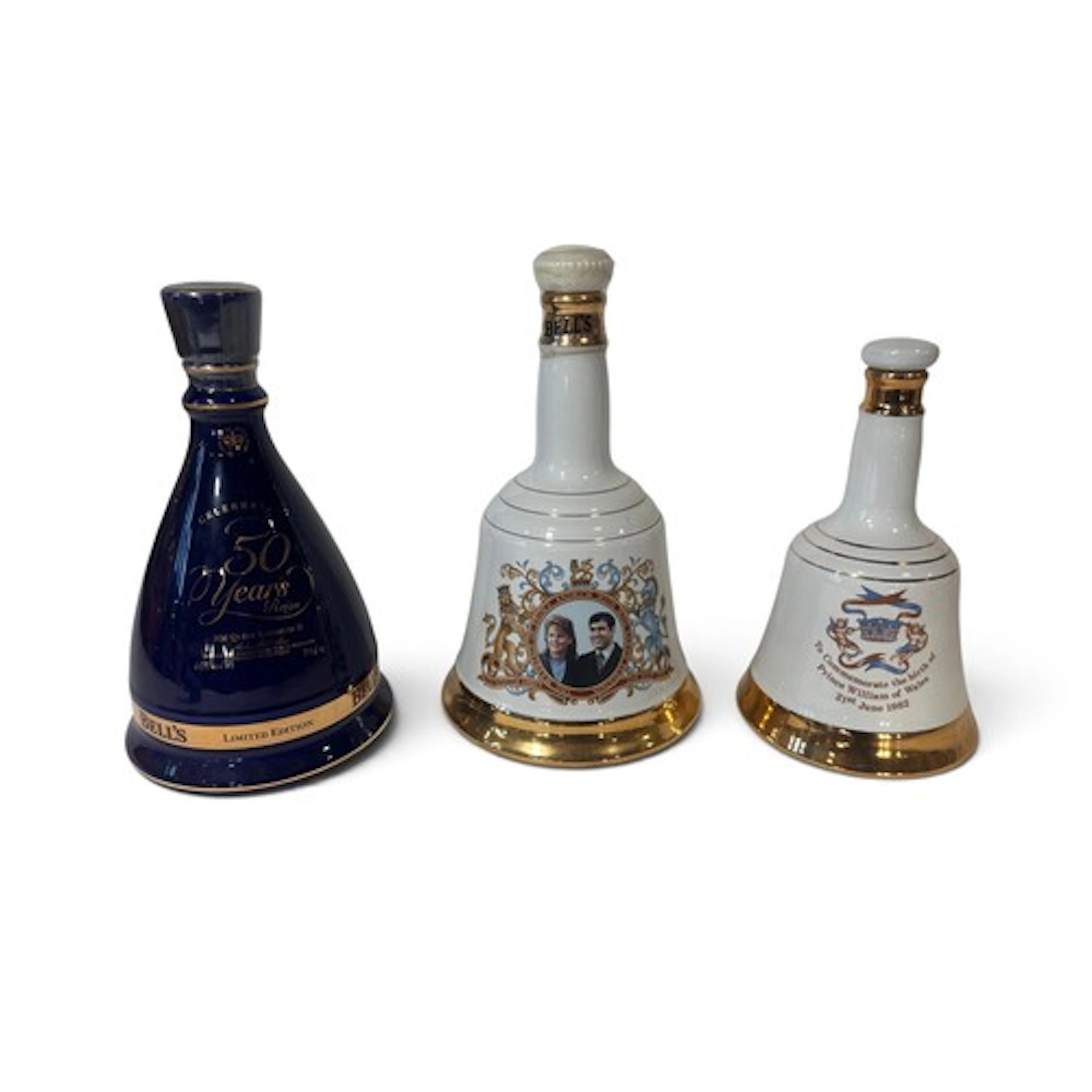 Three Bell's commemorative whisky decanters (still sealed)
