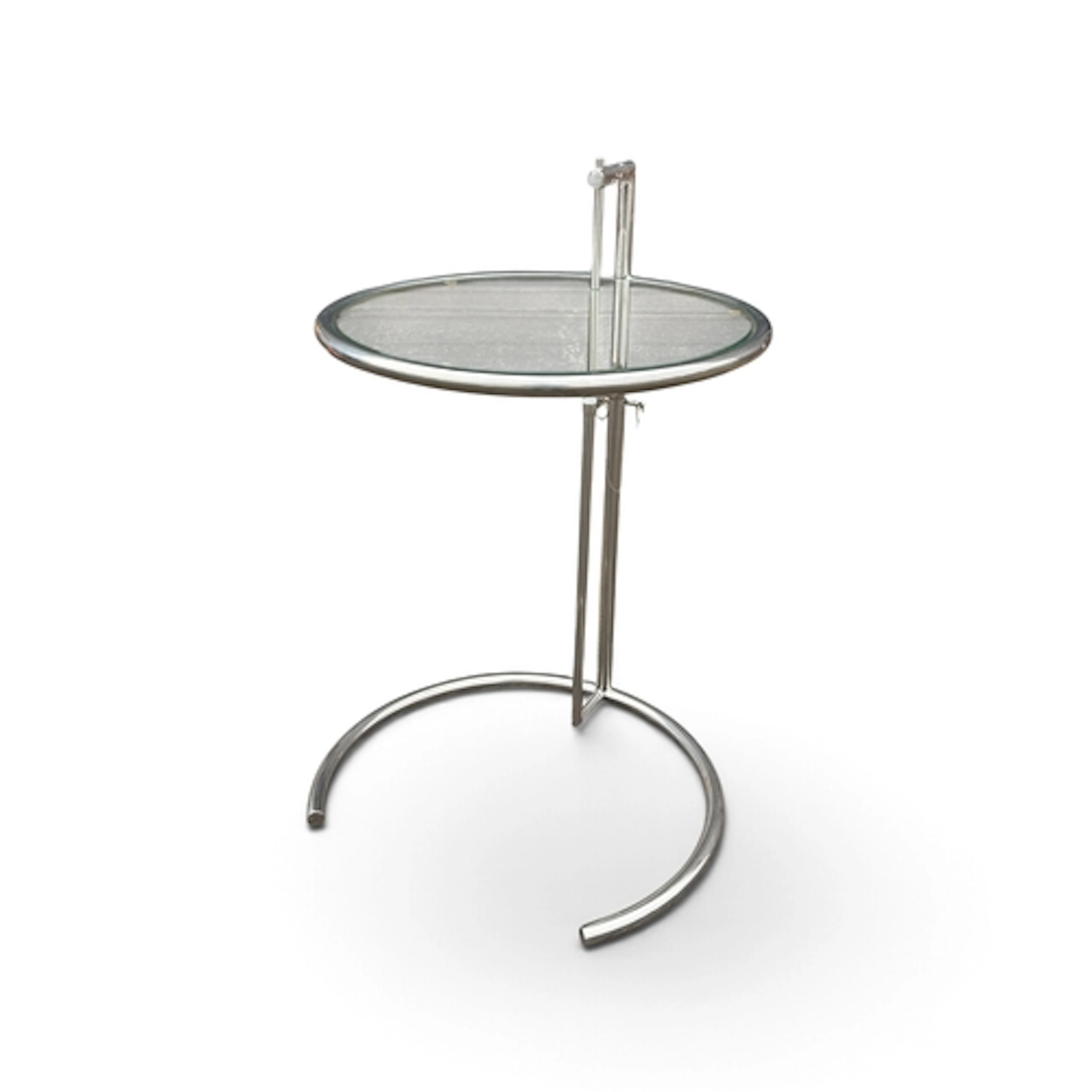 ATTRIBUTED TO EILEEN GRAY: A CONTEMPORARY CHROME AND GLASS T...