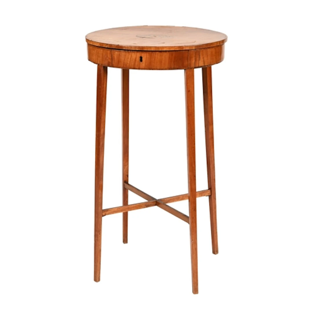 A Regency oval satinwood work table, with shell patera and c...