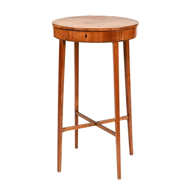 A Regency oval satinwood work table, with shell patera and c...