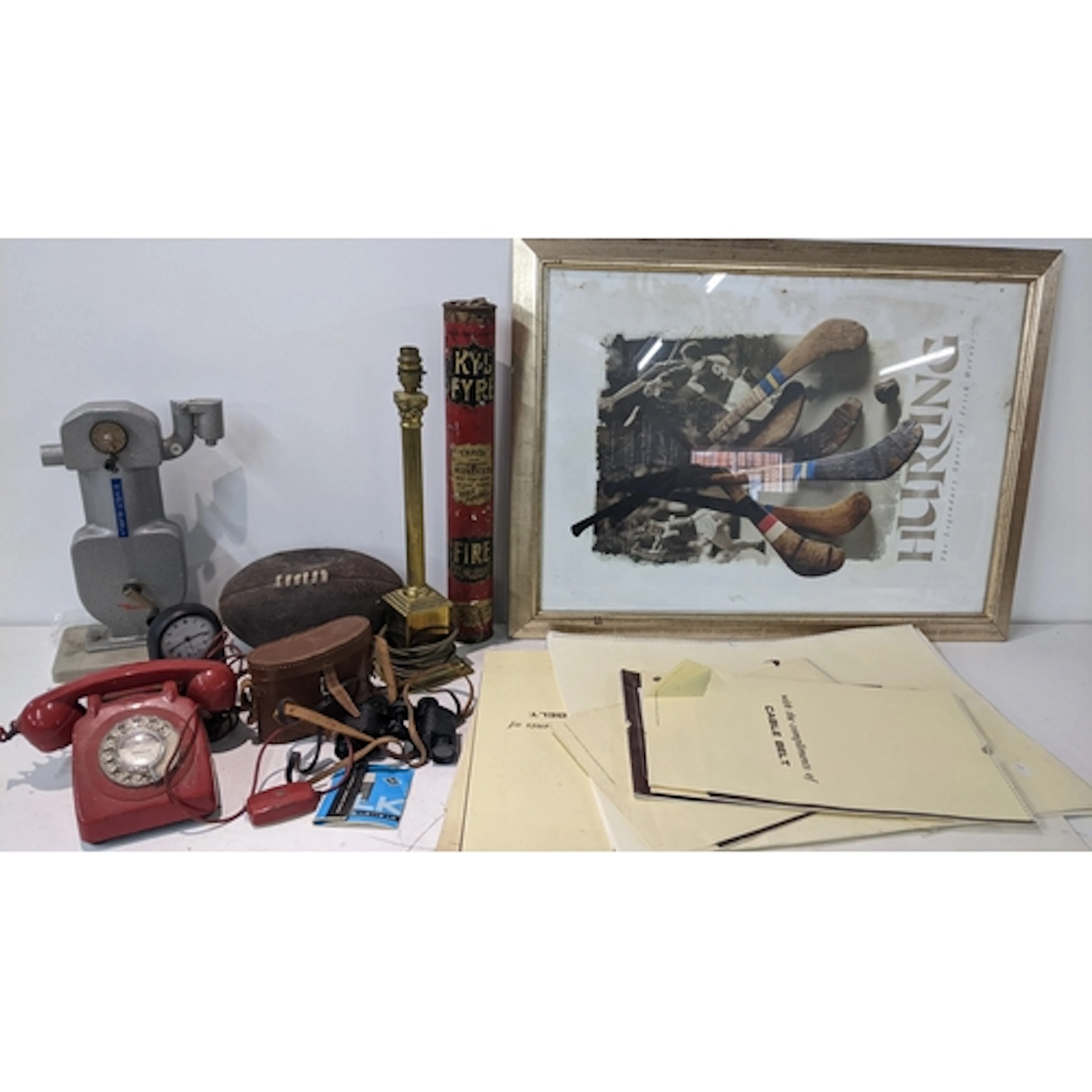 A mixed lot to include vintage Pirelli calendars, red Bakeli...