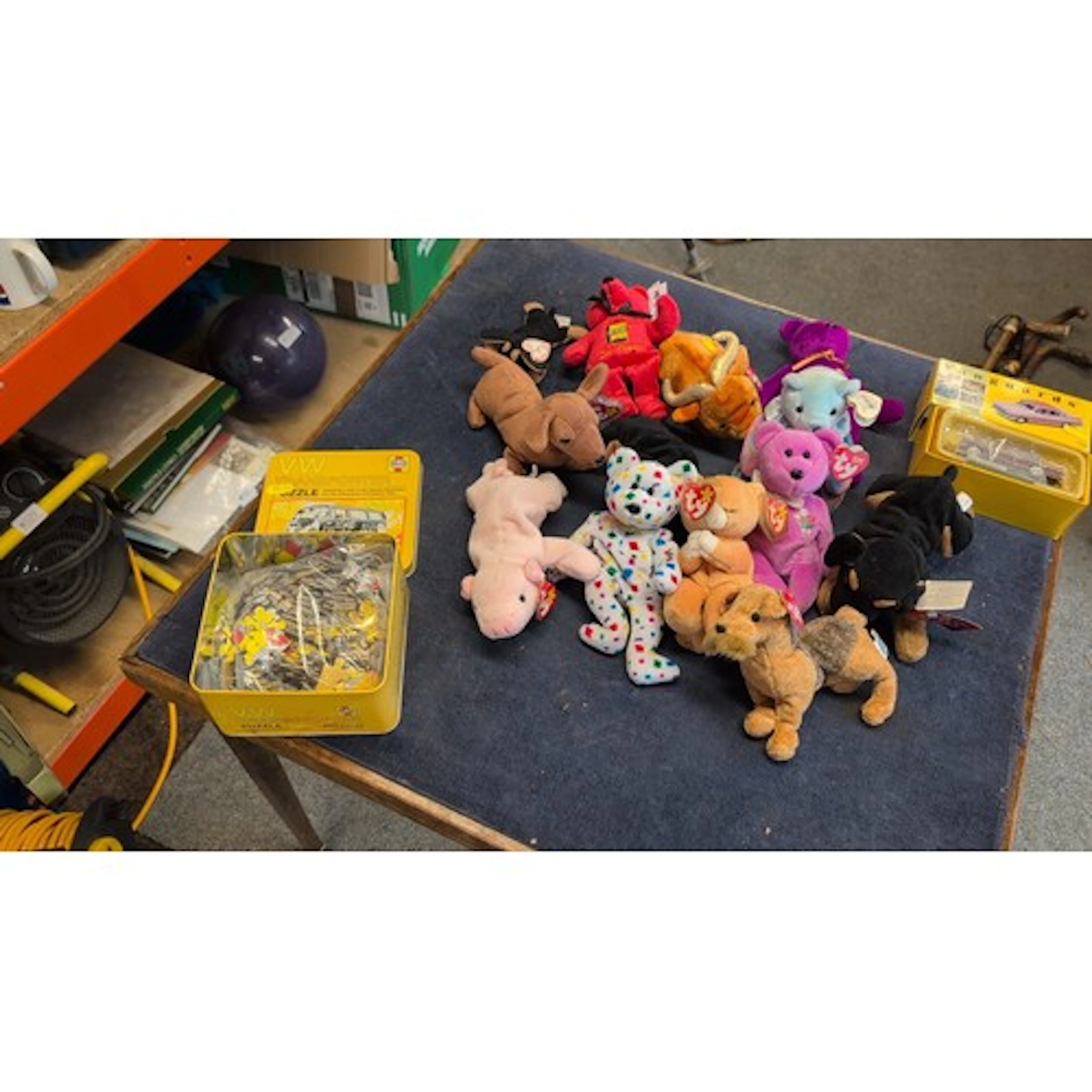 A group of TY Beanie Babies plush toys, various character de...
