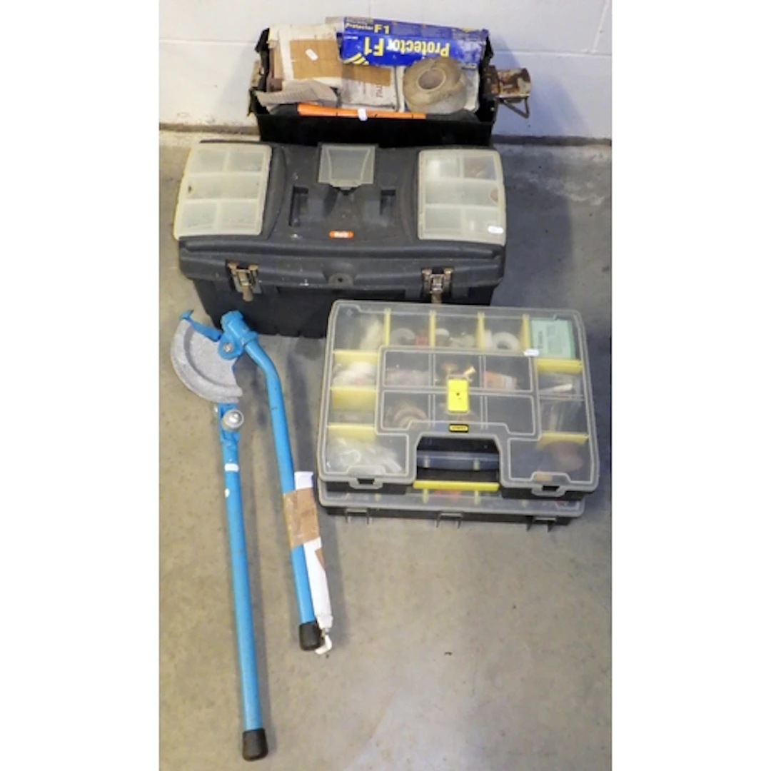 A pipe bender, toolbox, tiles etc