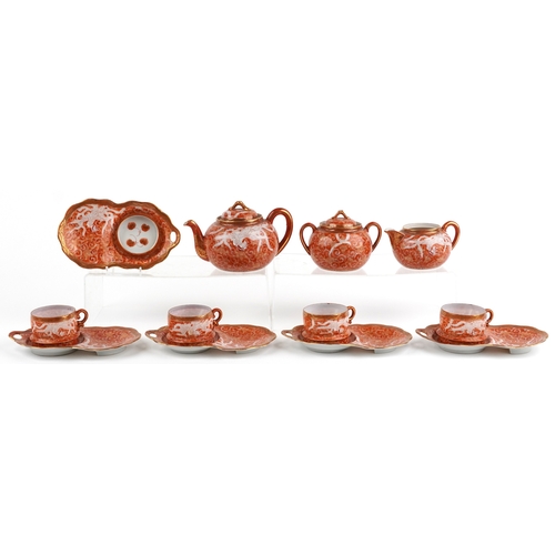 A Japanese kutani porcelain four place part tea service hand...