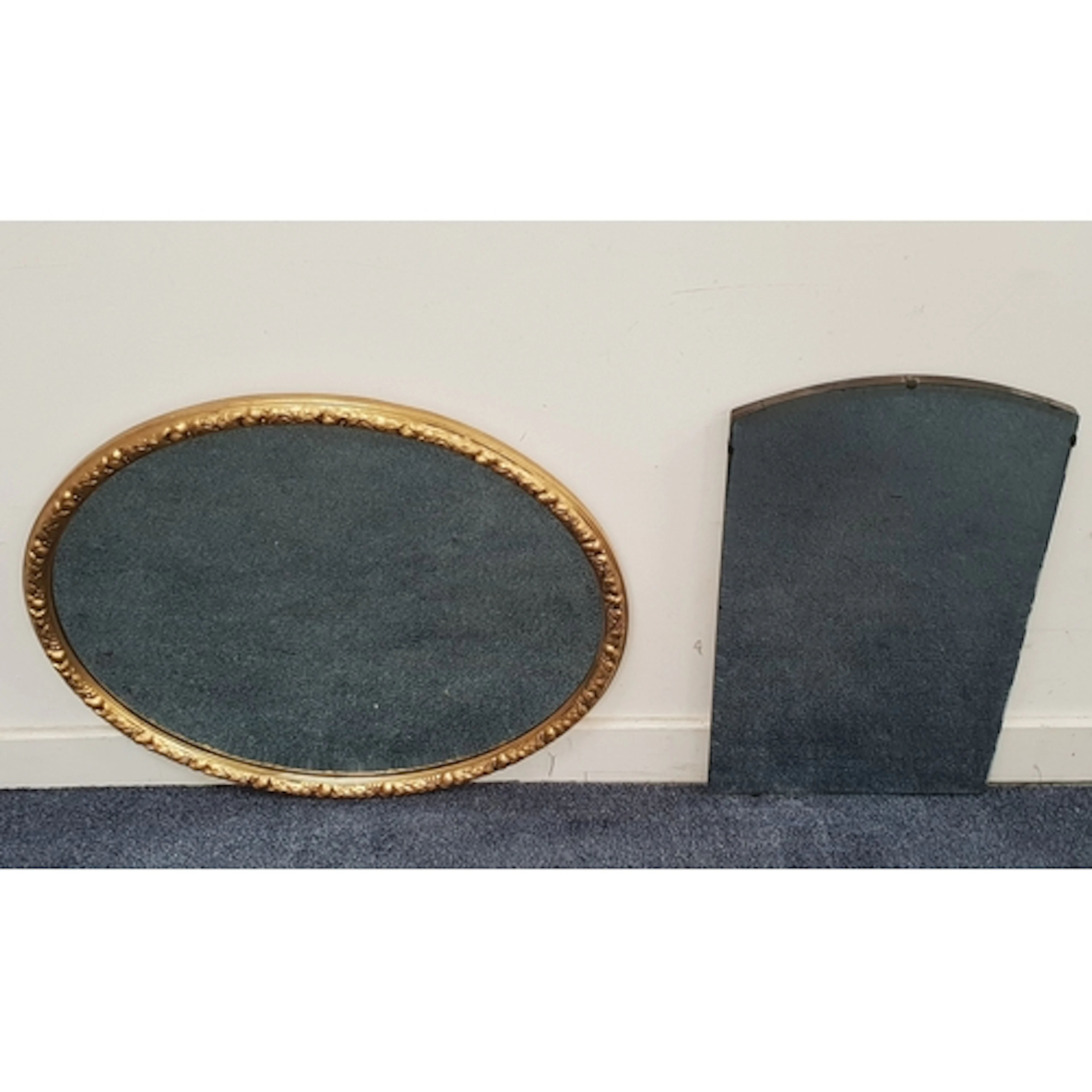 PAIR OF VINTAGE WALL MIRRORS comprising a frameless bevel-e...