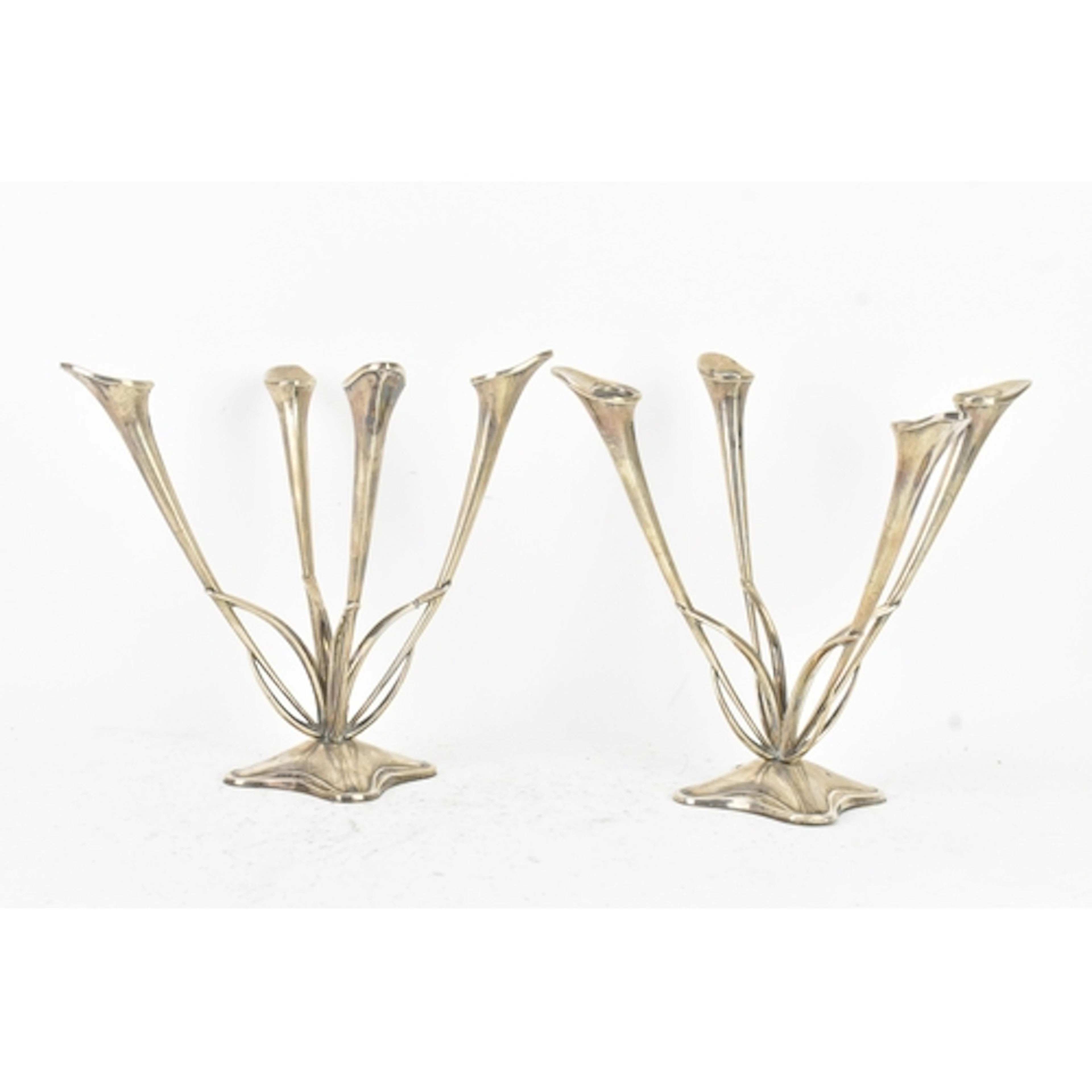 A pair of Spanish silver candelabras, in the Art Nouveau sty...