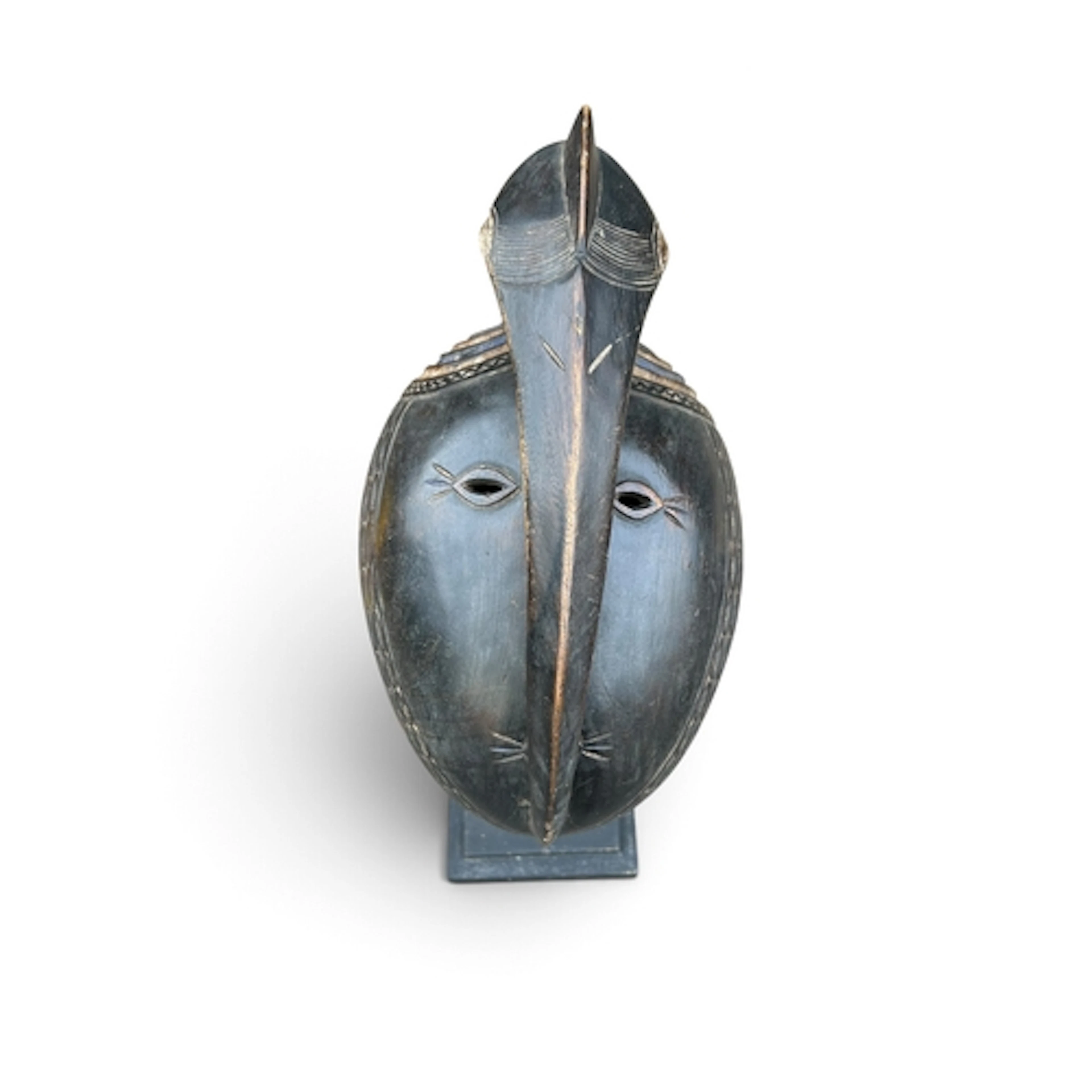 A SENOUFO MASK FROM THE IVORY COAST 33cm L