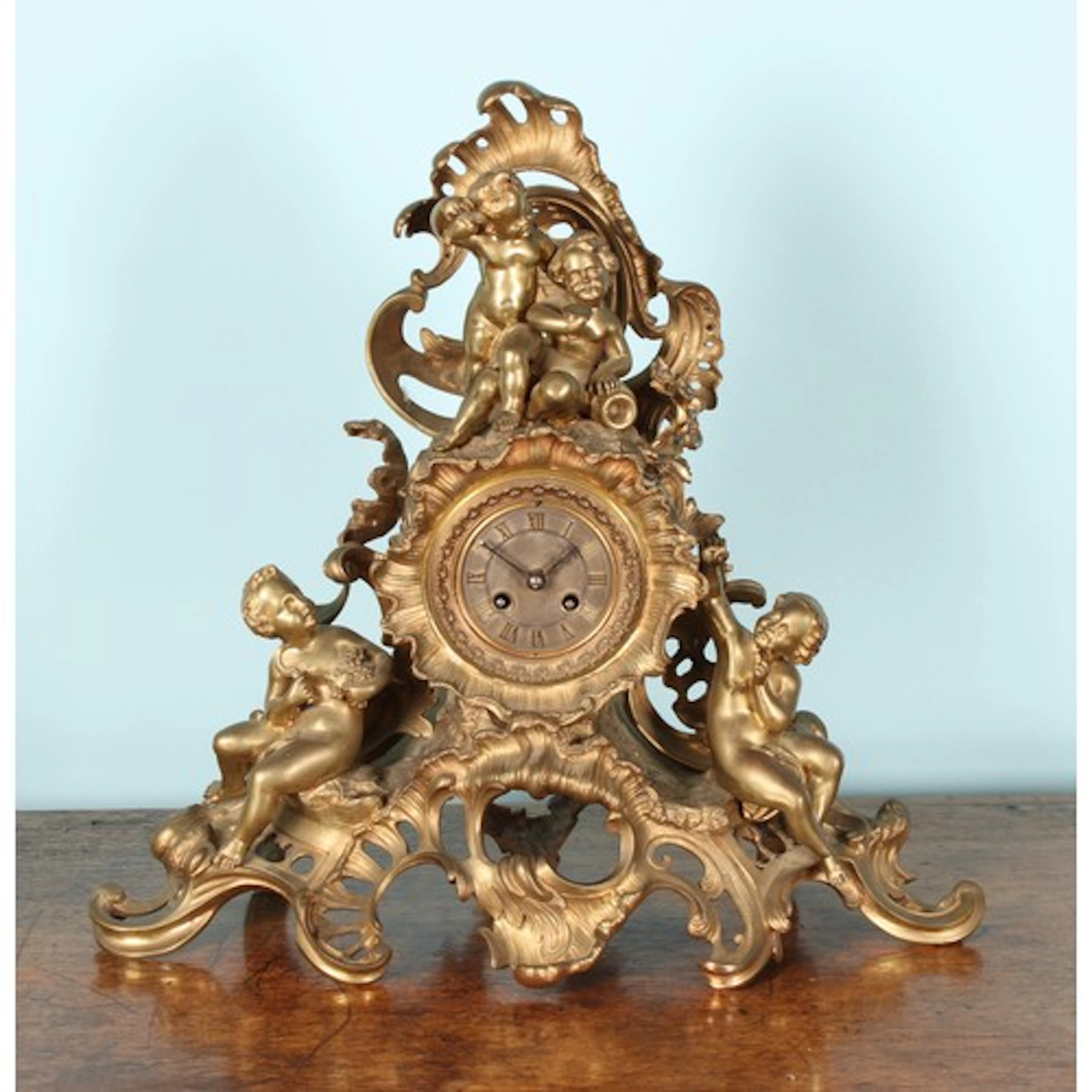 A late 19th century French gilt metal table or mantel clock,...