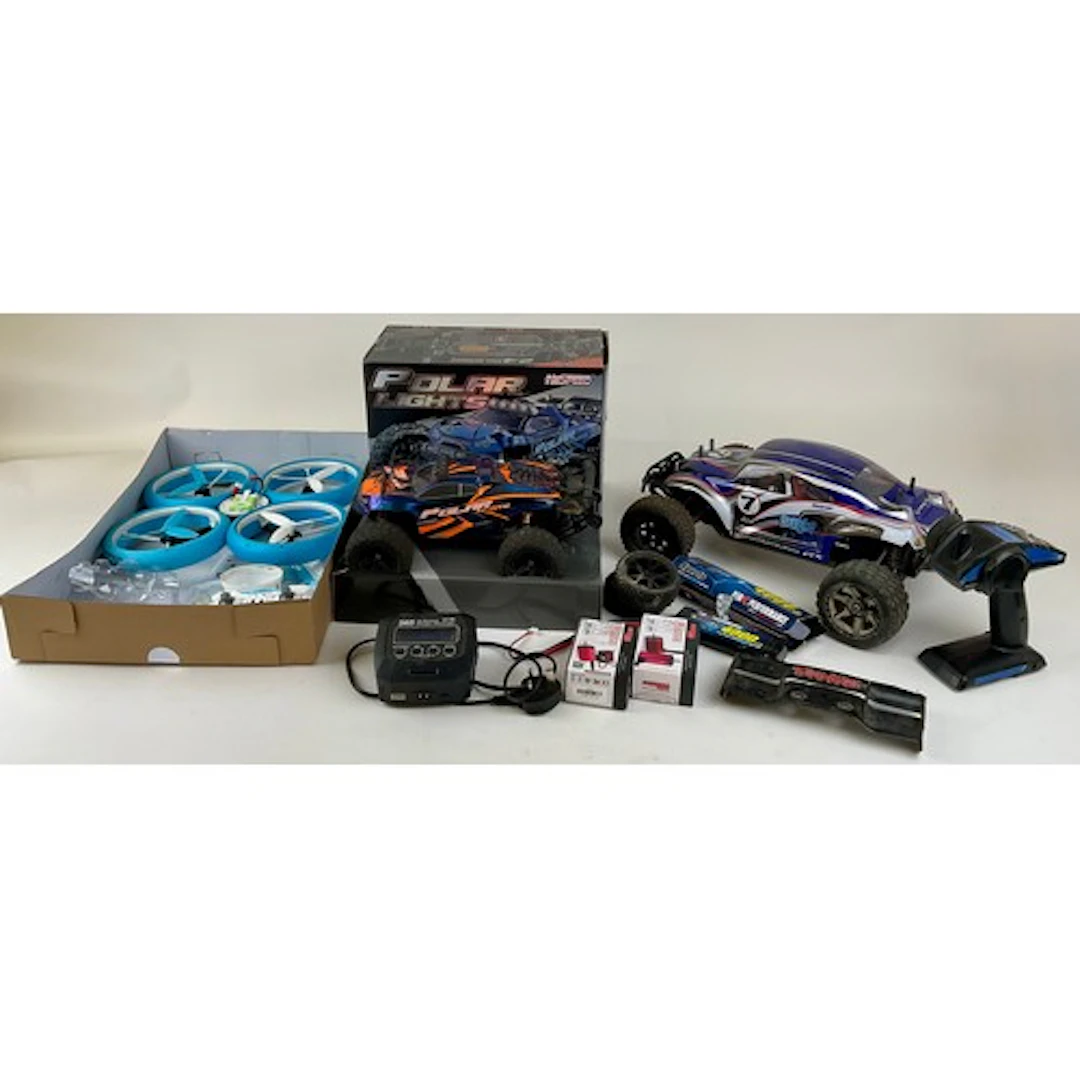 A Polar Lights RC Car, 4WD, 2.4GHz, 1:14 scale, boxed; a FTX...