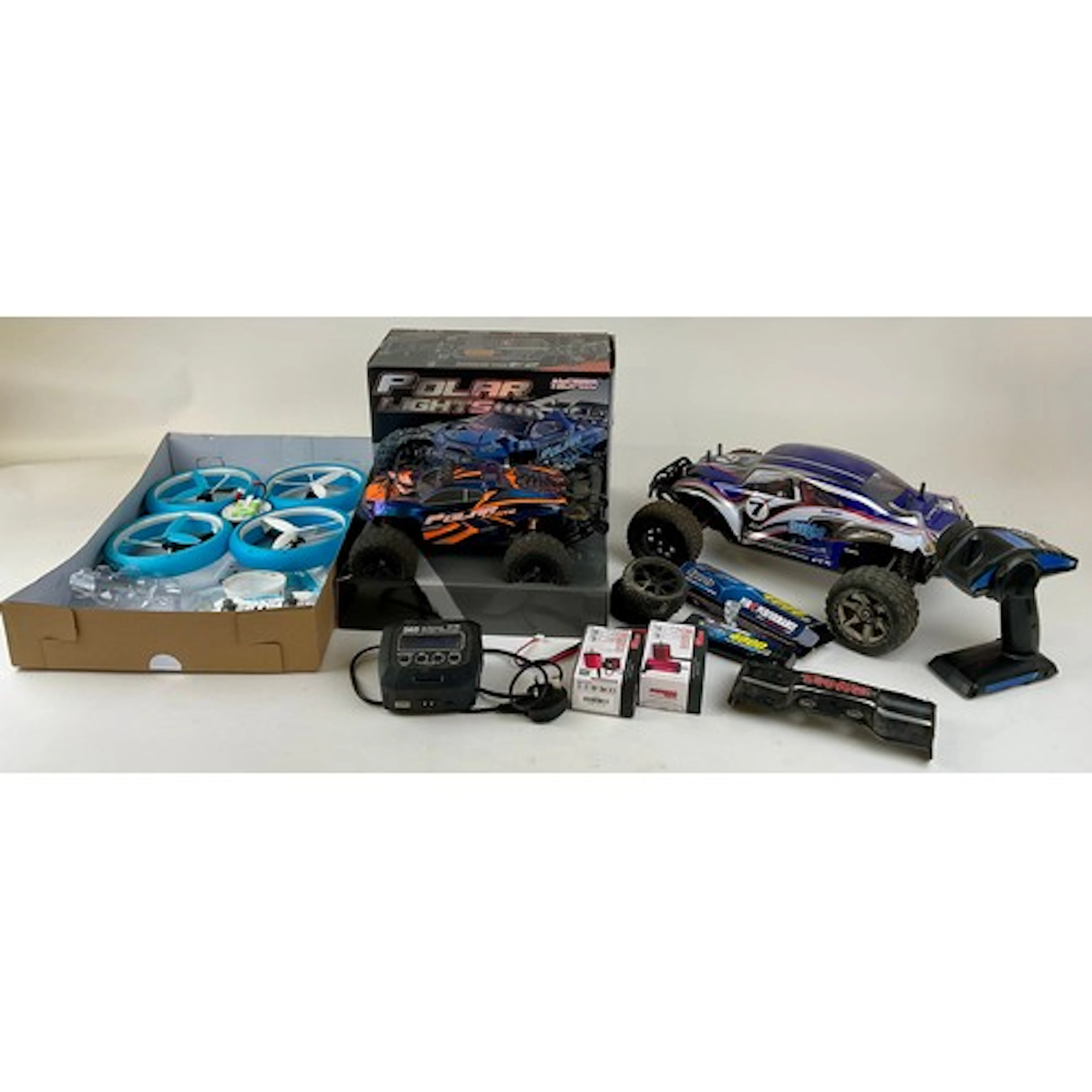 A Polar Lights RC Car, 4WD, 2.4GHz, 1:14 scale, boxed; a FTX...
