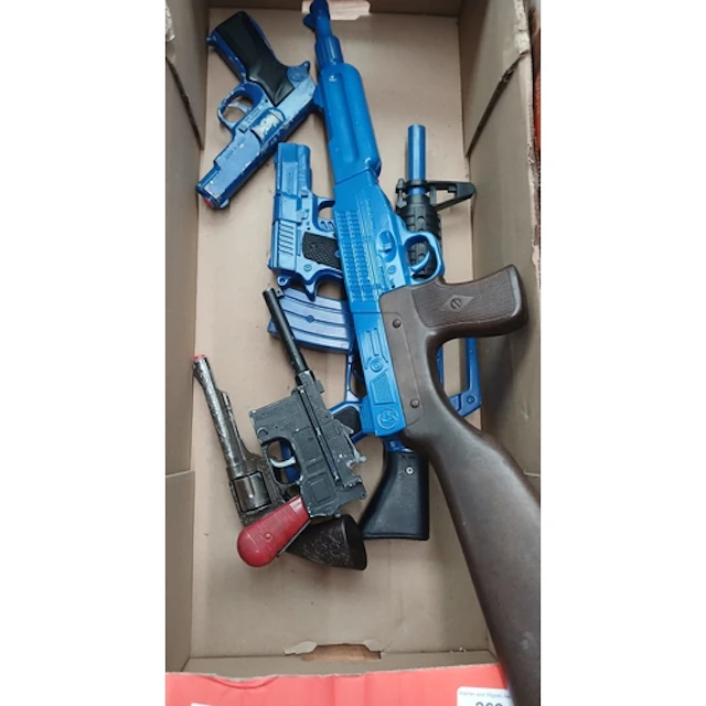 A group of assorted toy cap guns to include an Lone Star Man...