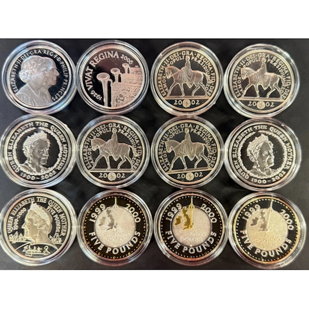 A group of 12 UK QEII £5 silver proof coins, comprising 1999...