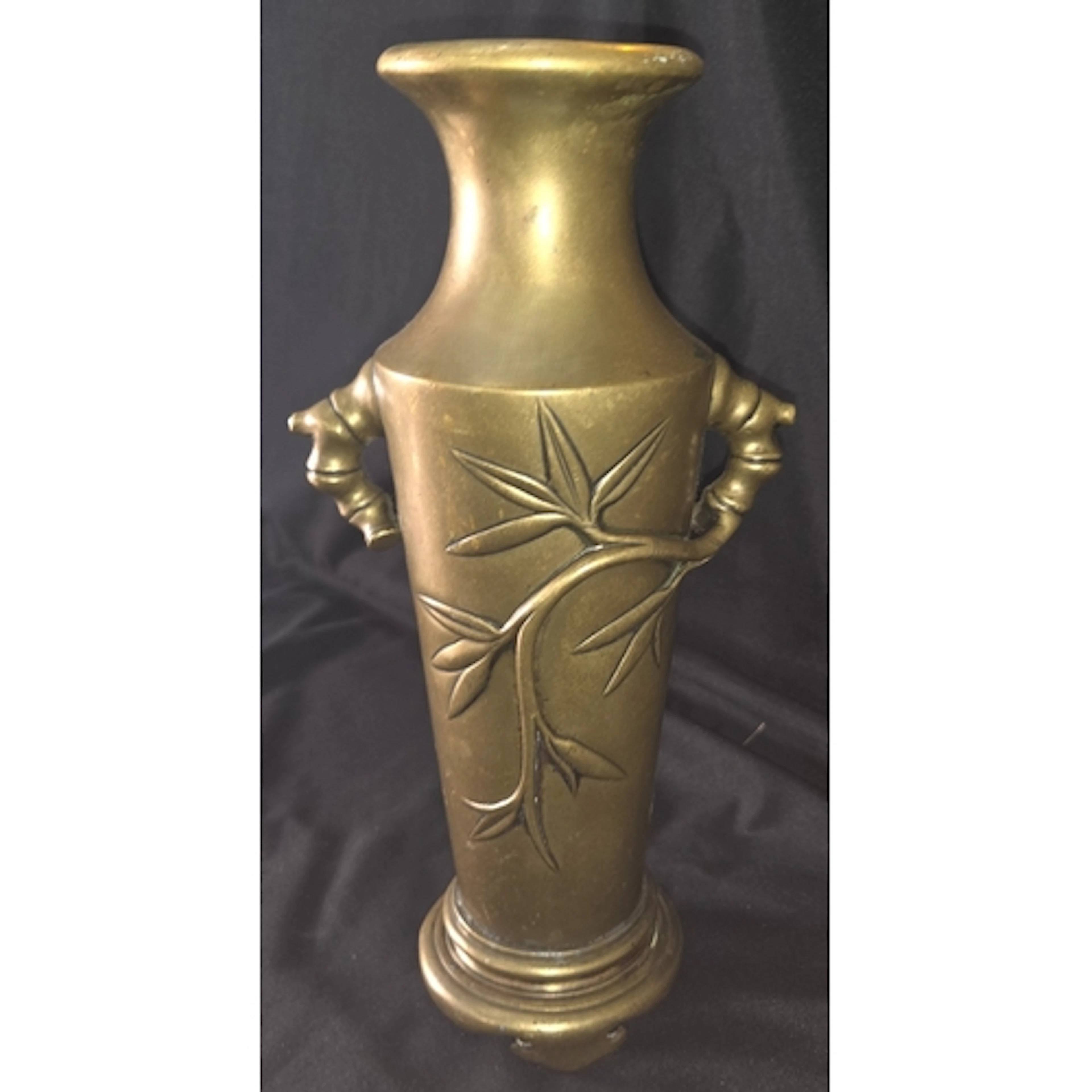 A Chinese bronze vase with scrolling tree branch decoration,...