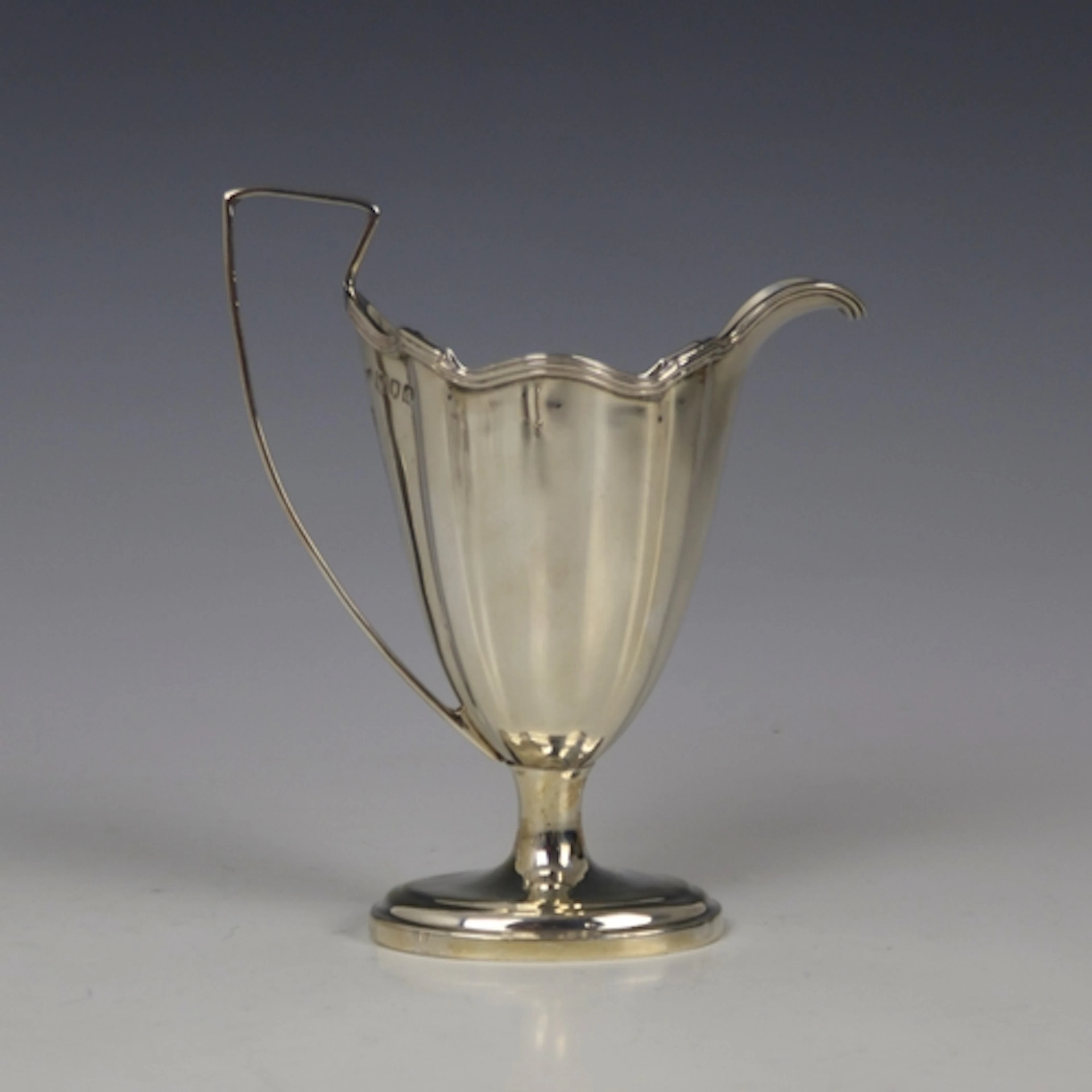 A Victorian silver cream jug, Thomas Bradbury & Sons, London...