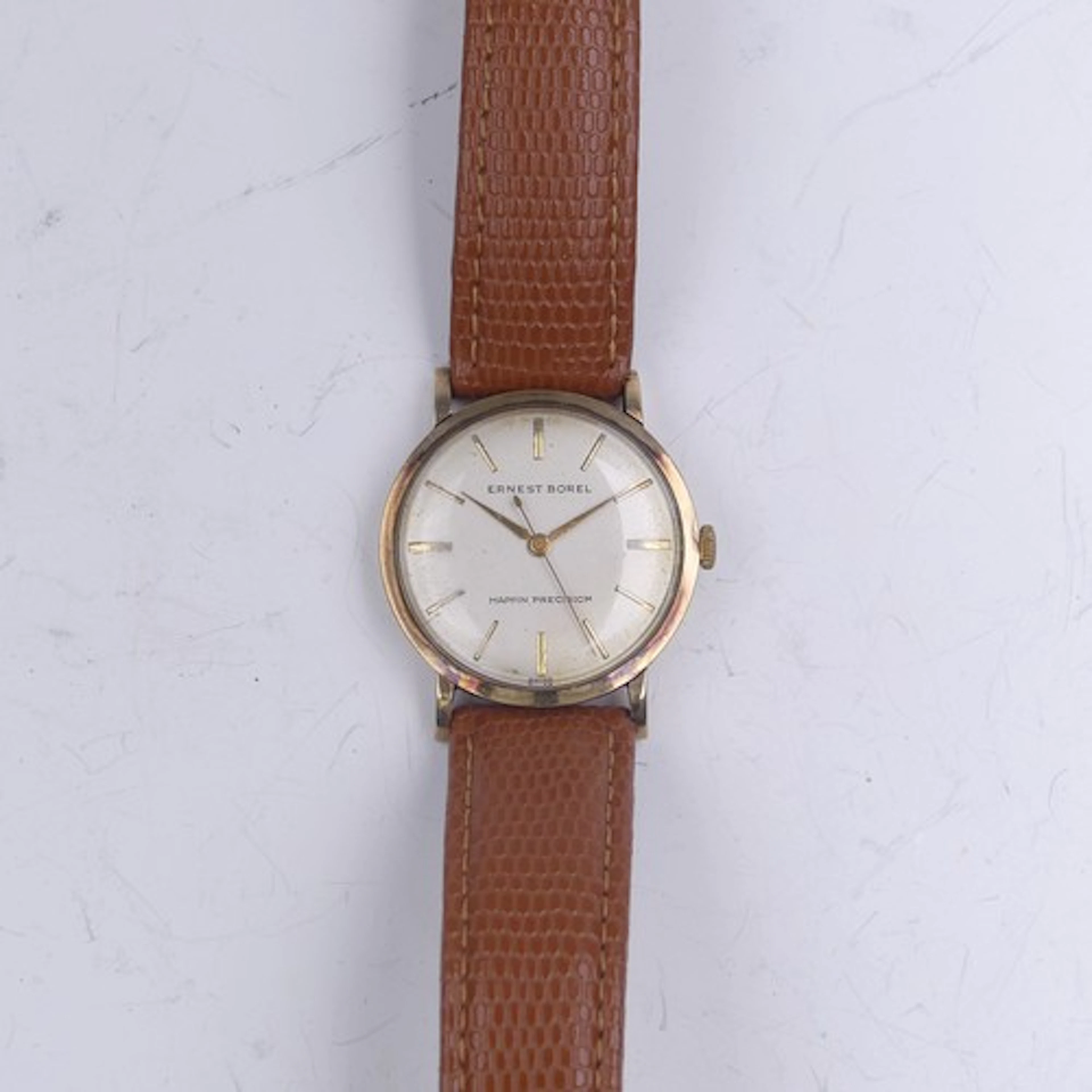 A 9ct gold Ernest Borel Wristwatch, the signed silvered dial...