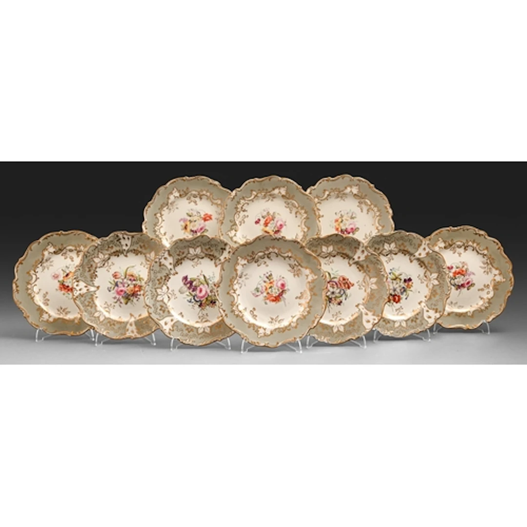 Two sets of Coalport dessert plates, c1825, painted with a c...