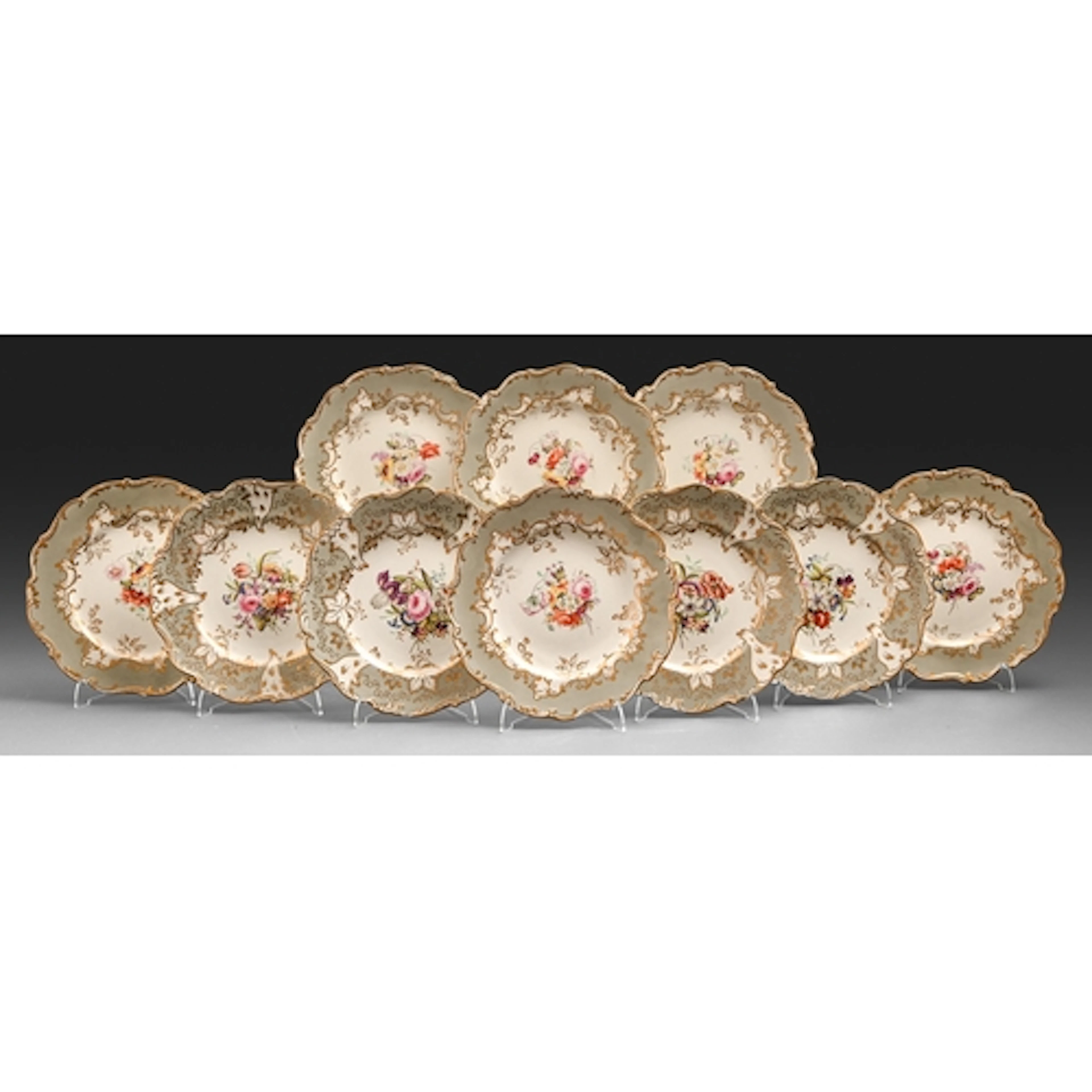 Two sets of Coalport dessert plates, c1825, painted with a c...