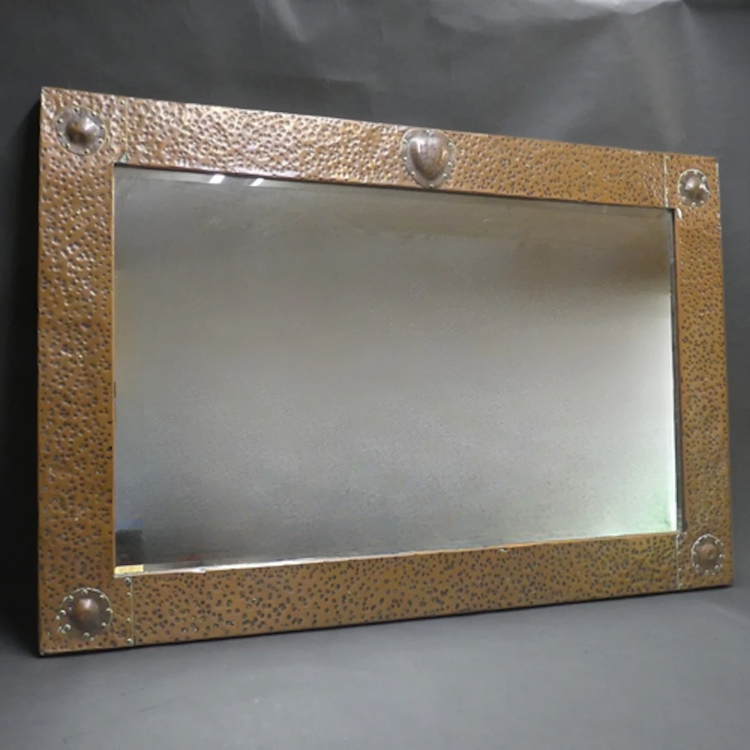 A large Arts & Crafts rectangular hammered copper clad wall ...