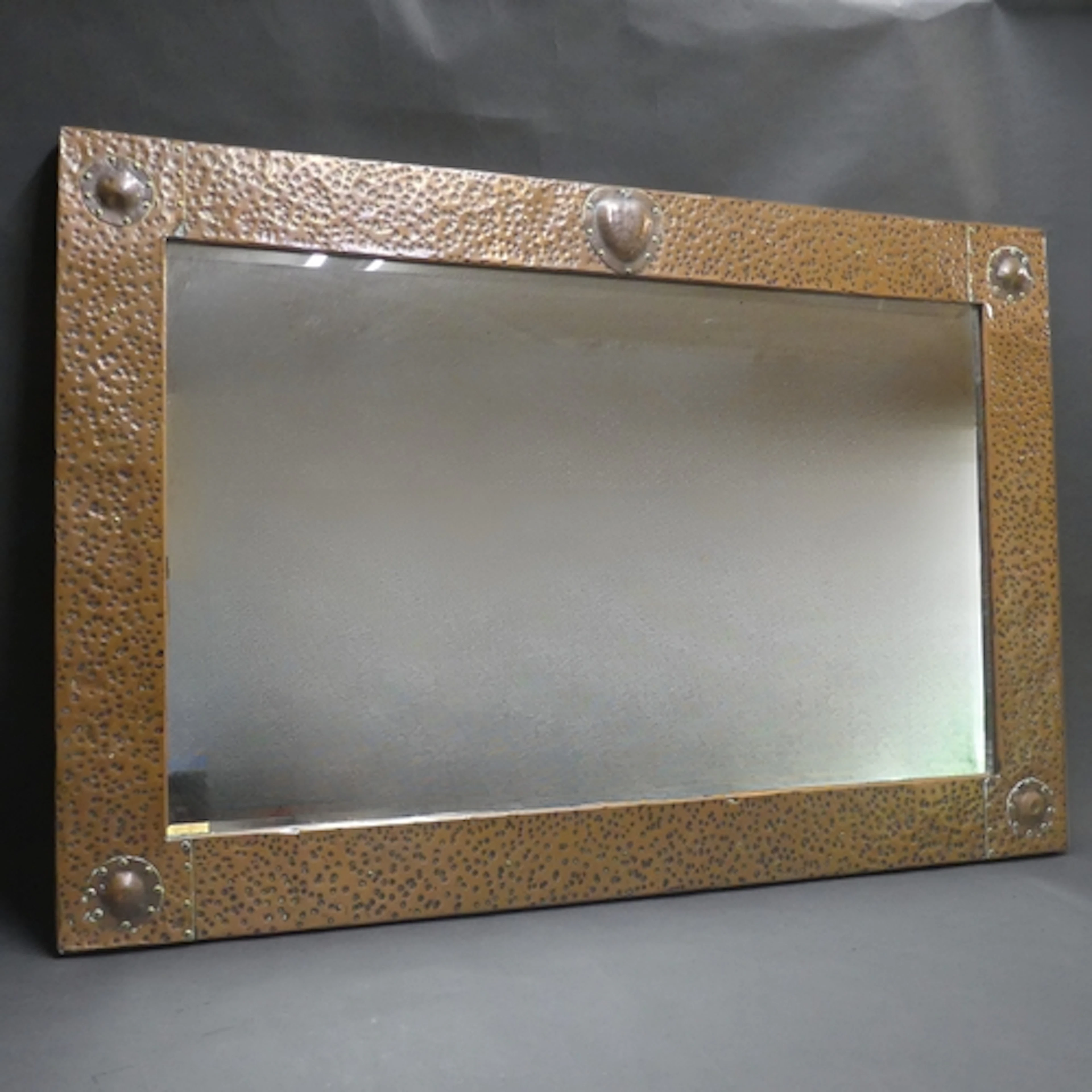 A large Arts & Crafts rectangular hammered copper clad wall ...