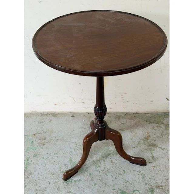 A Georgian style mahogany tripod table,circular top on a tur...