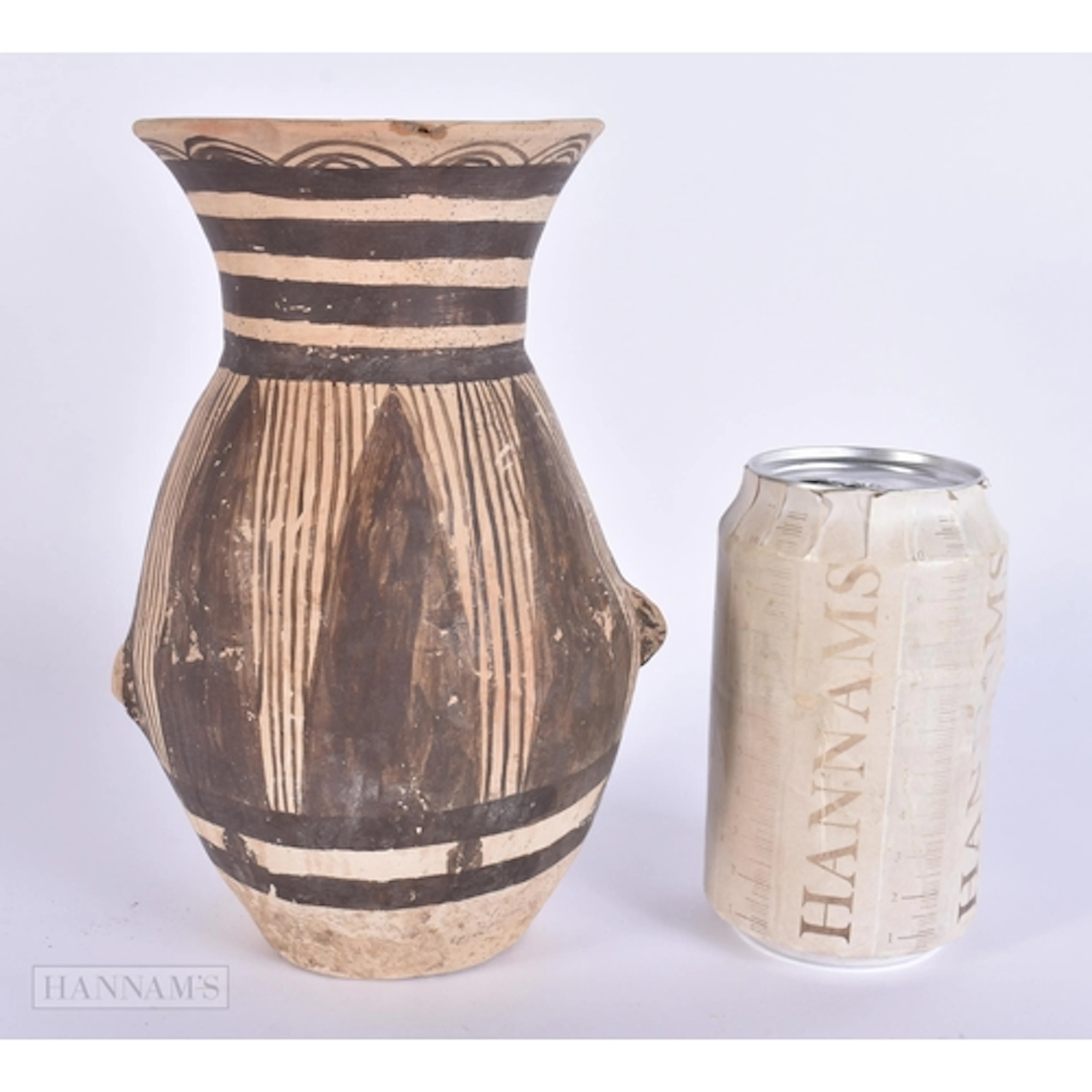 A CHINESE NEOLITHIC PERIOD POTTERY VASE painted with black m...