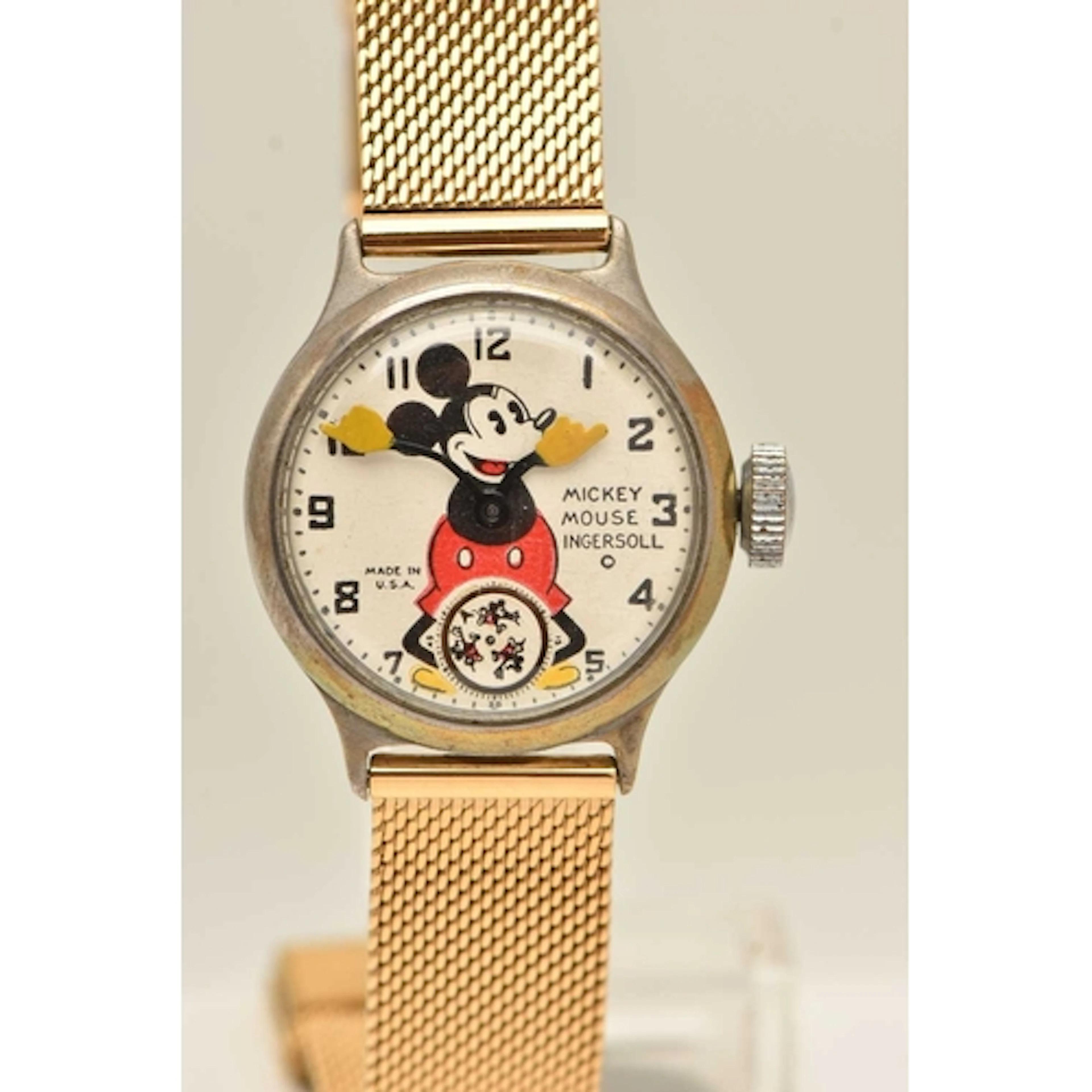 A 'MICKEY MOUSE INGERSOLL' WRISTWATCH, a round with dial wit...