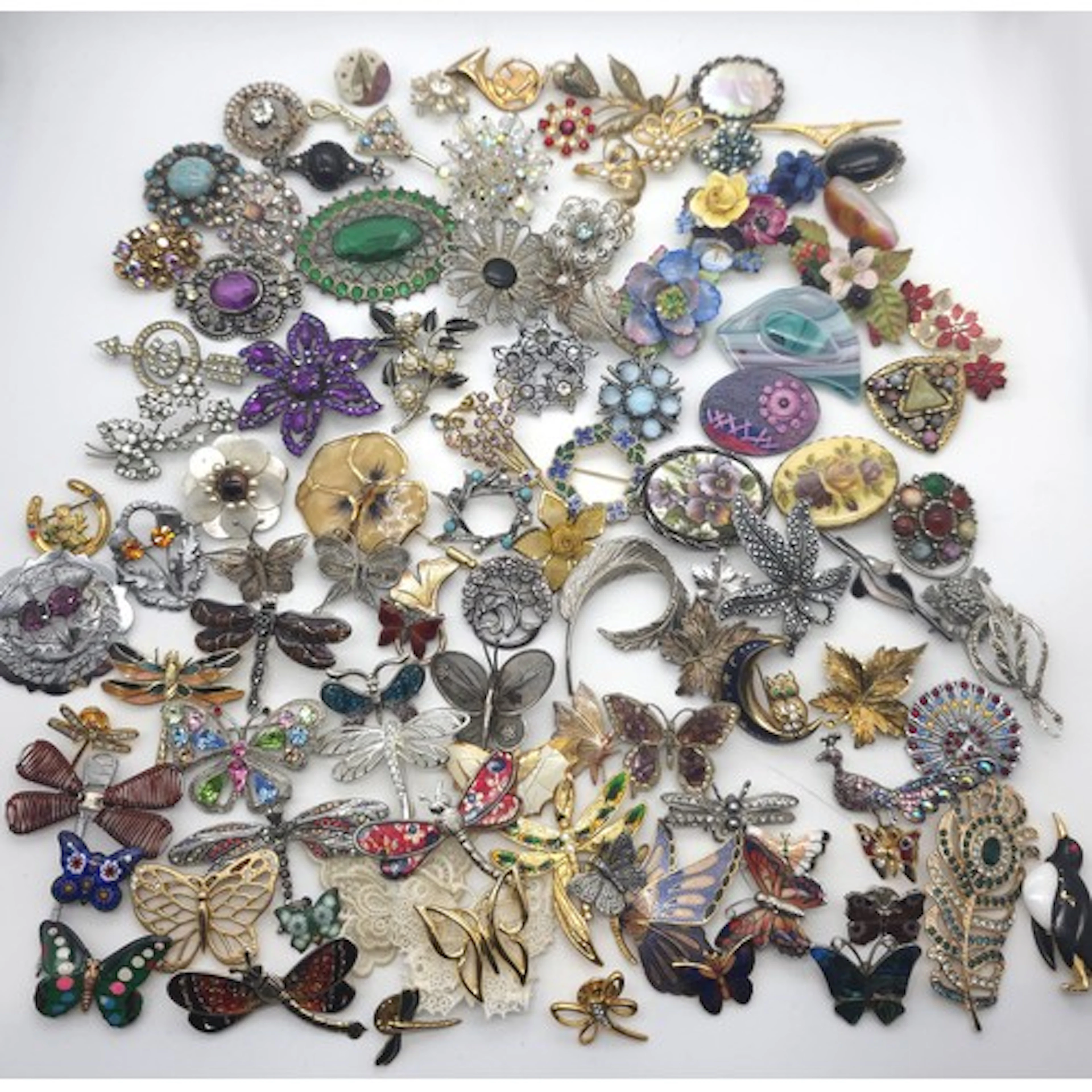 A collection of various costume brooches, to include butterf...