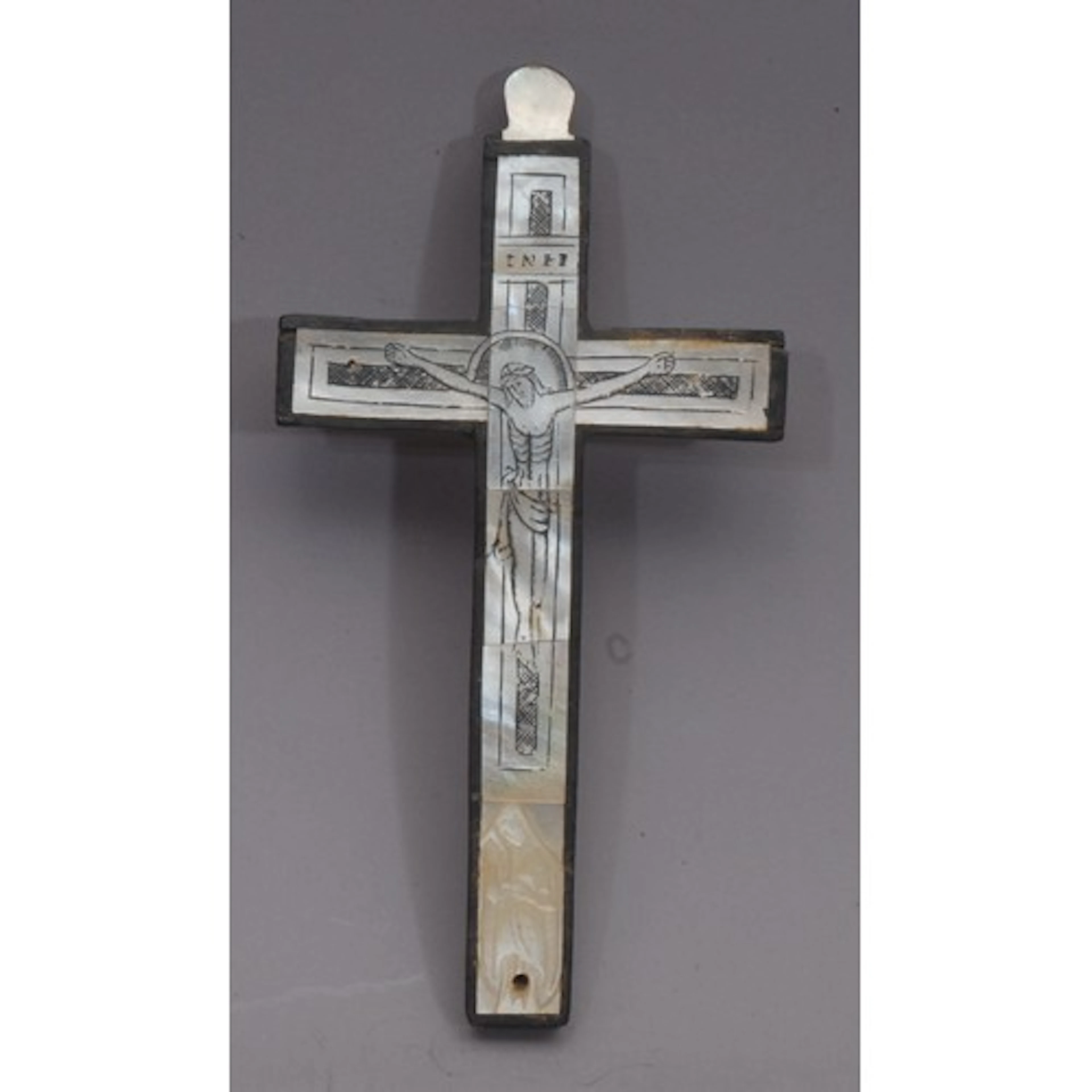 An early 20th century softwood and mother of pearl mounted c...