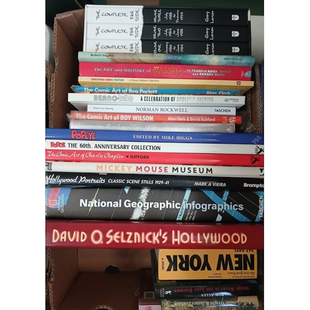 Nine boxes of assorted mainly hardback books, fiction and no...
