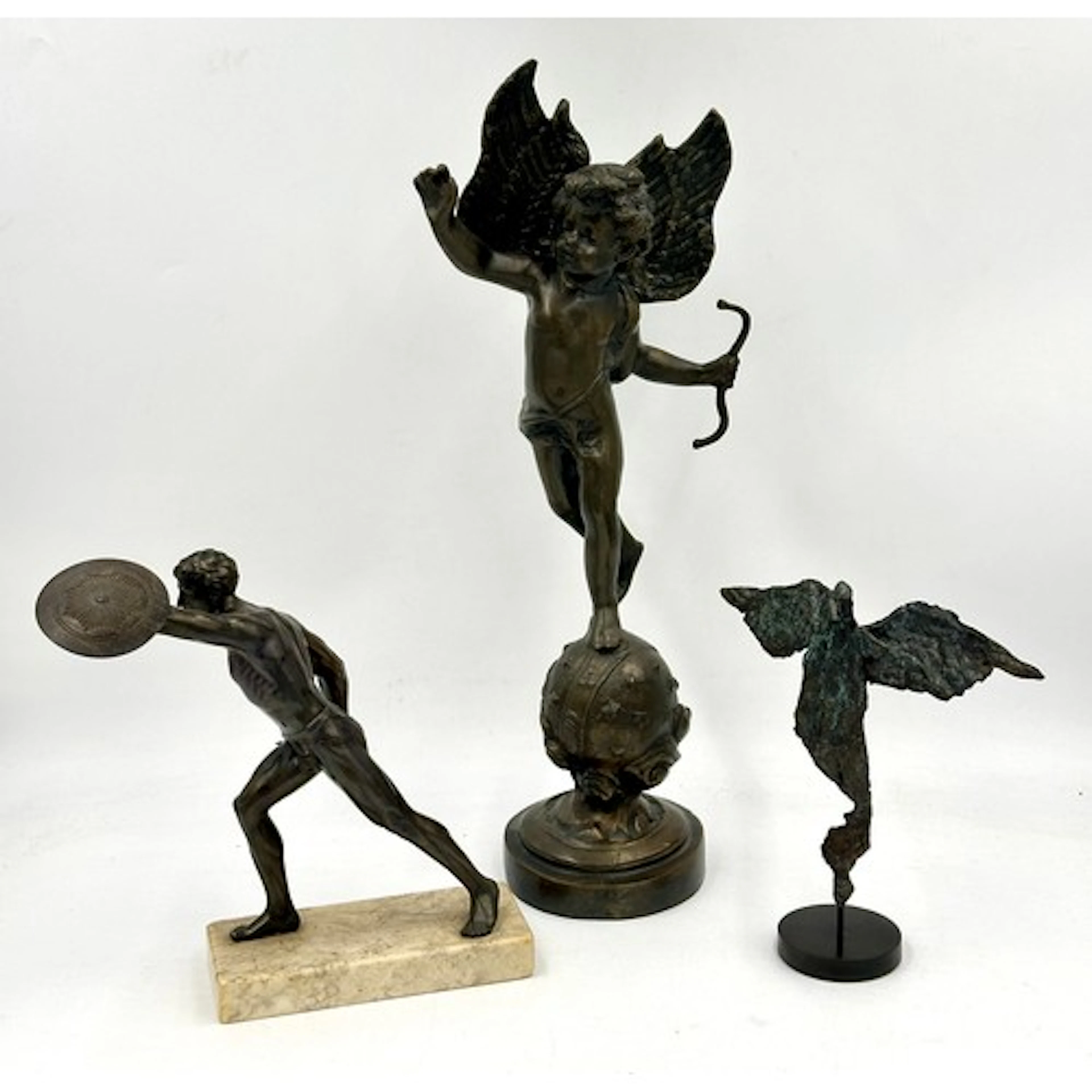 A patinated bronze sculpture, unsigned but probably 'Accusin...