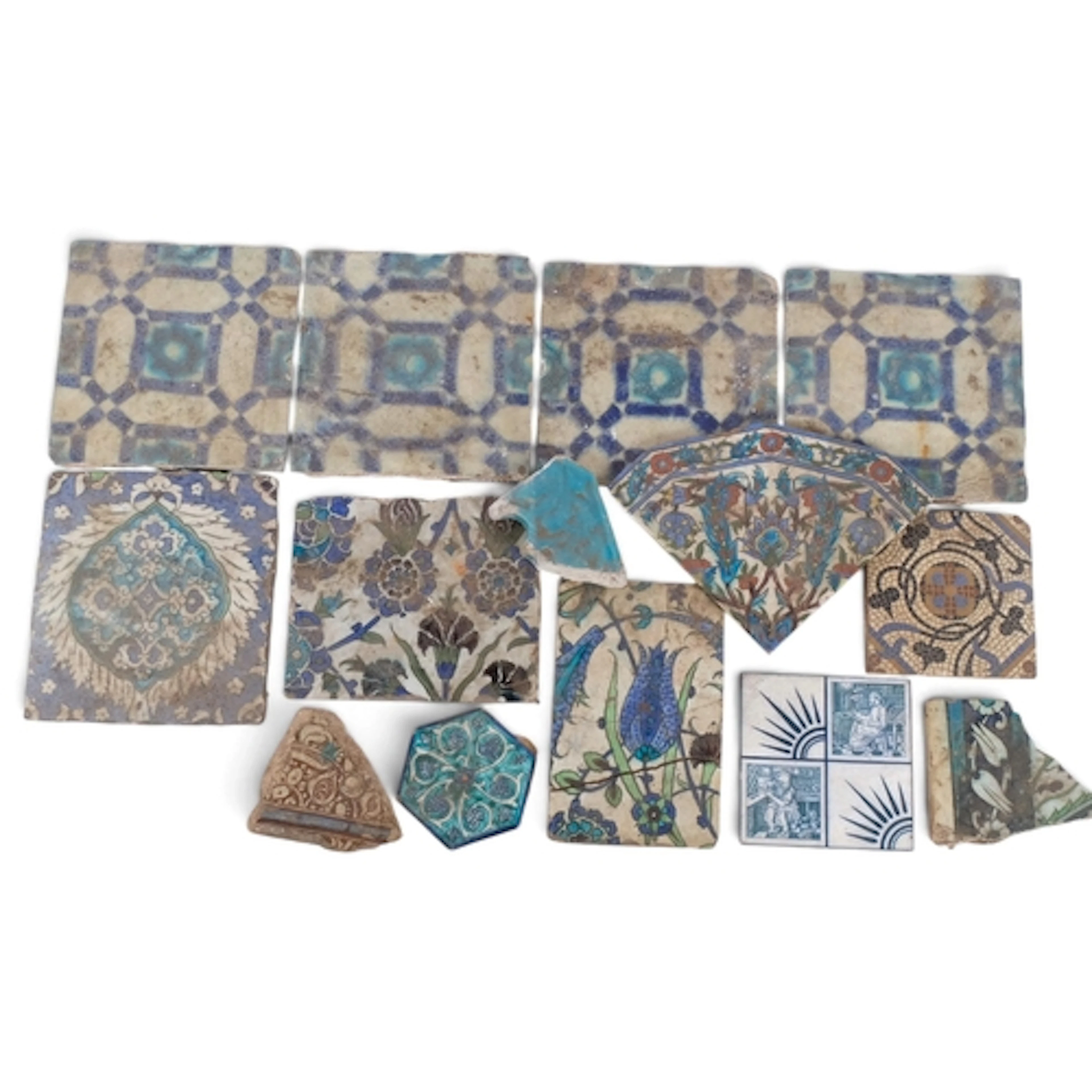 A collection of Antique Islamic and Iznik glazed pottery til...