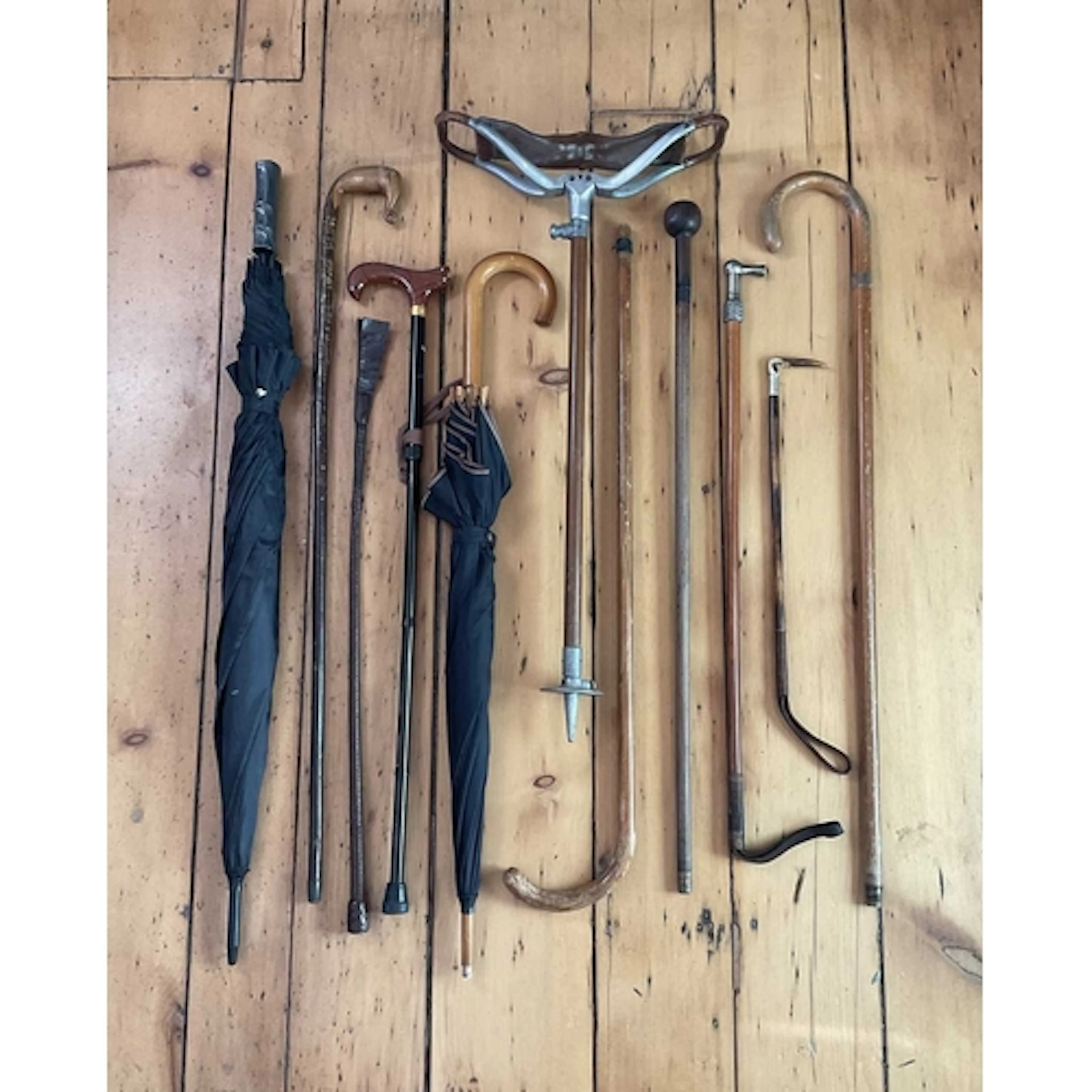 Lanvin Parfums Umbrella together with walking canes etc Lanv...