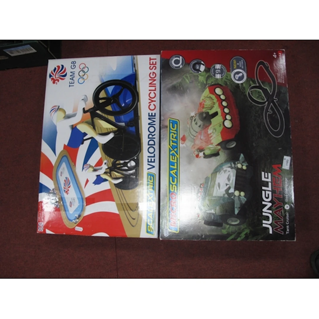 Two Scalextric sets, a Velodrome cycling set, and Micro Jung...