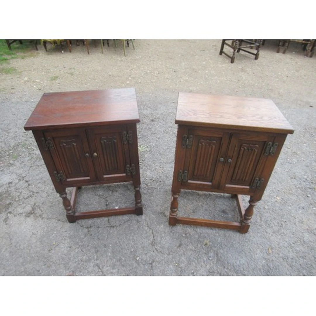 Two oak bedside cabinets