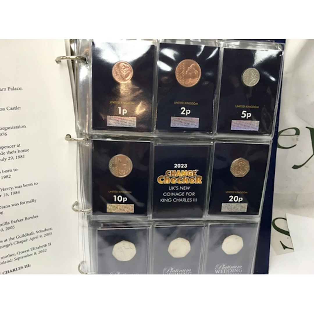An album containing assorted coinage including uncirculated ...